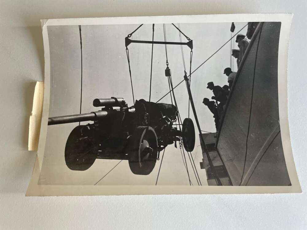 Press photo: Loading of large weaponry for African conflict.