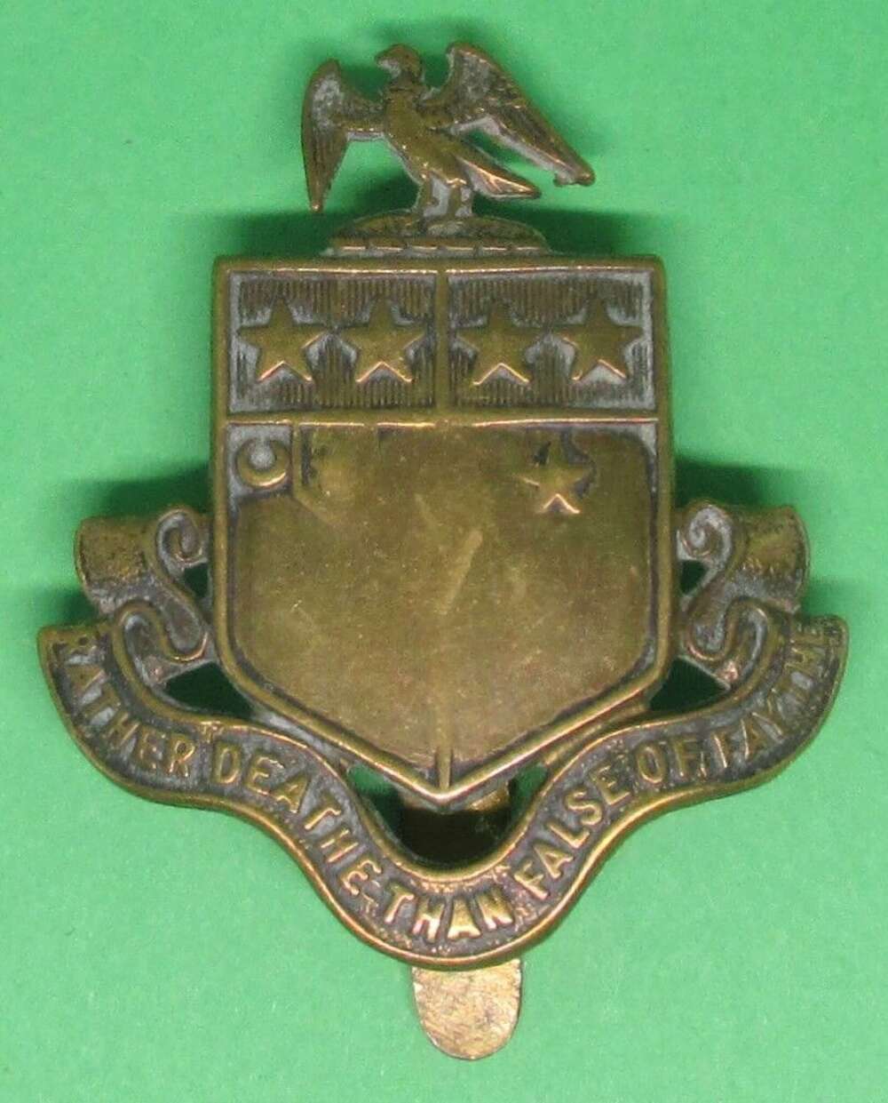 An Officer's Training college cap badge for St John's School