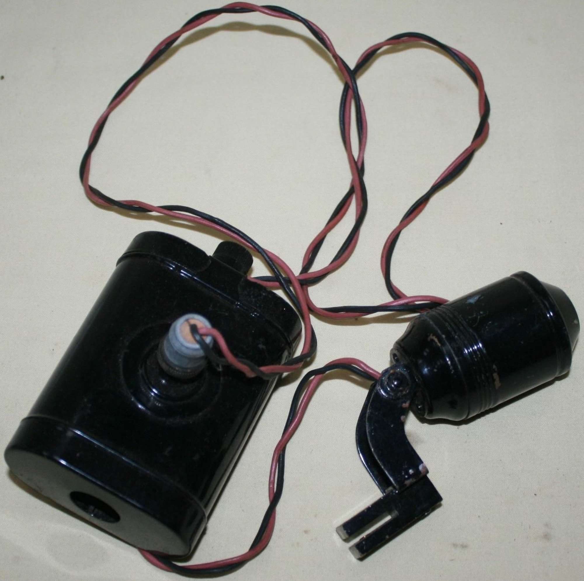 A WWII ARP SERVICES HELMET LAMP AND BATTERY PACK