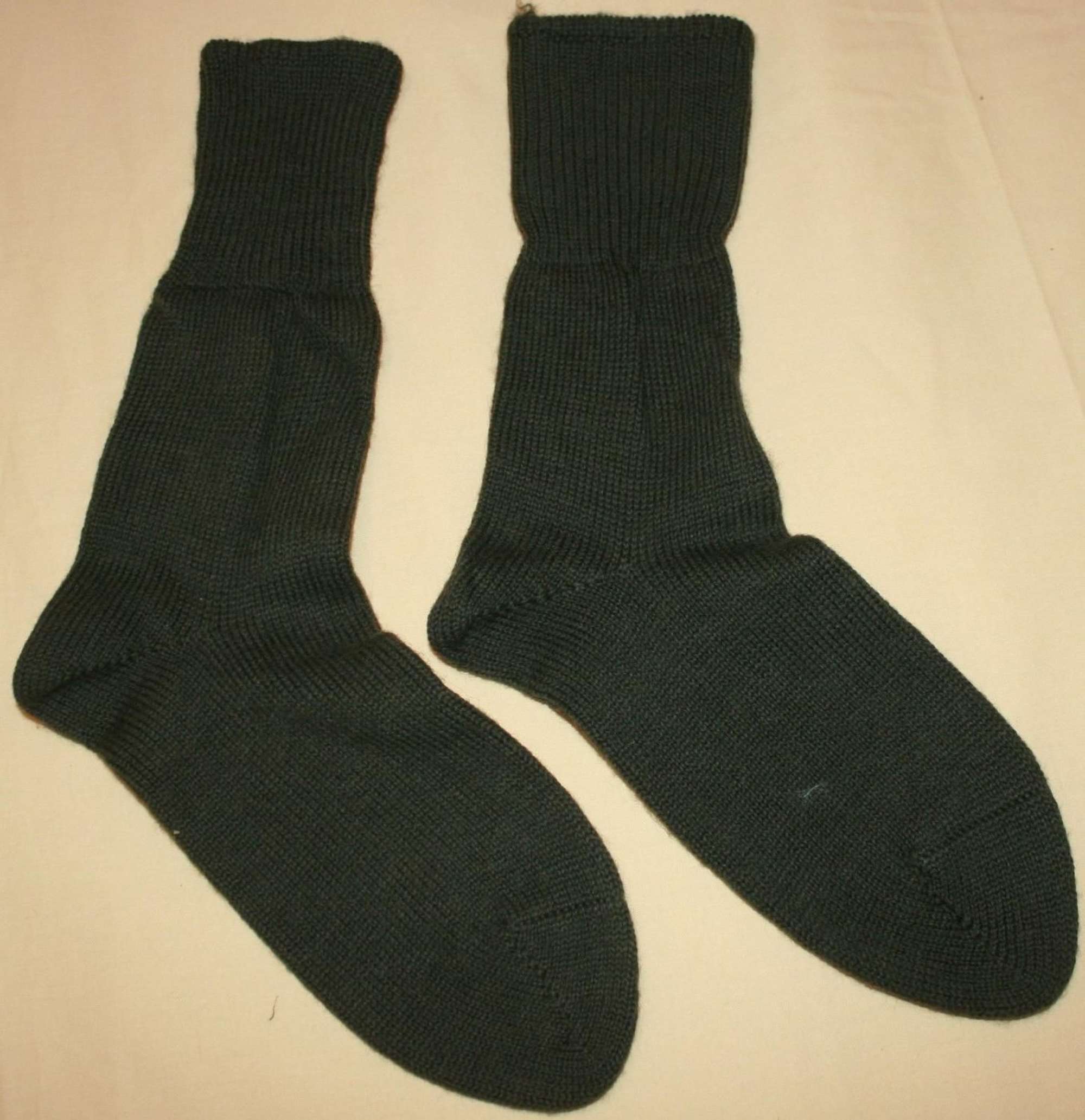 A MATCHING PAIR OF THE 1945 DATED JUNGLE SOCKS