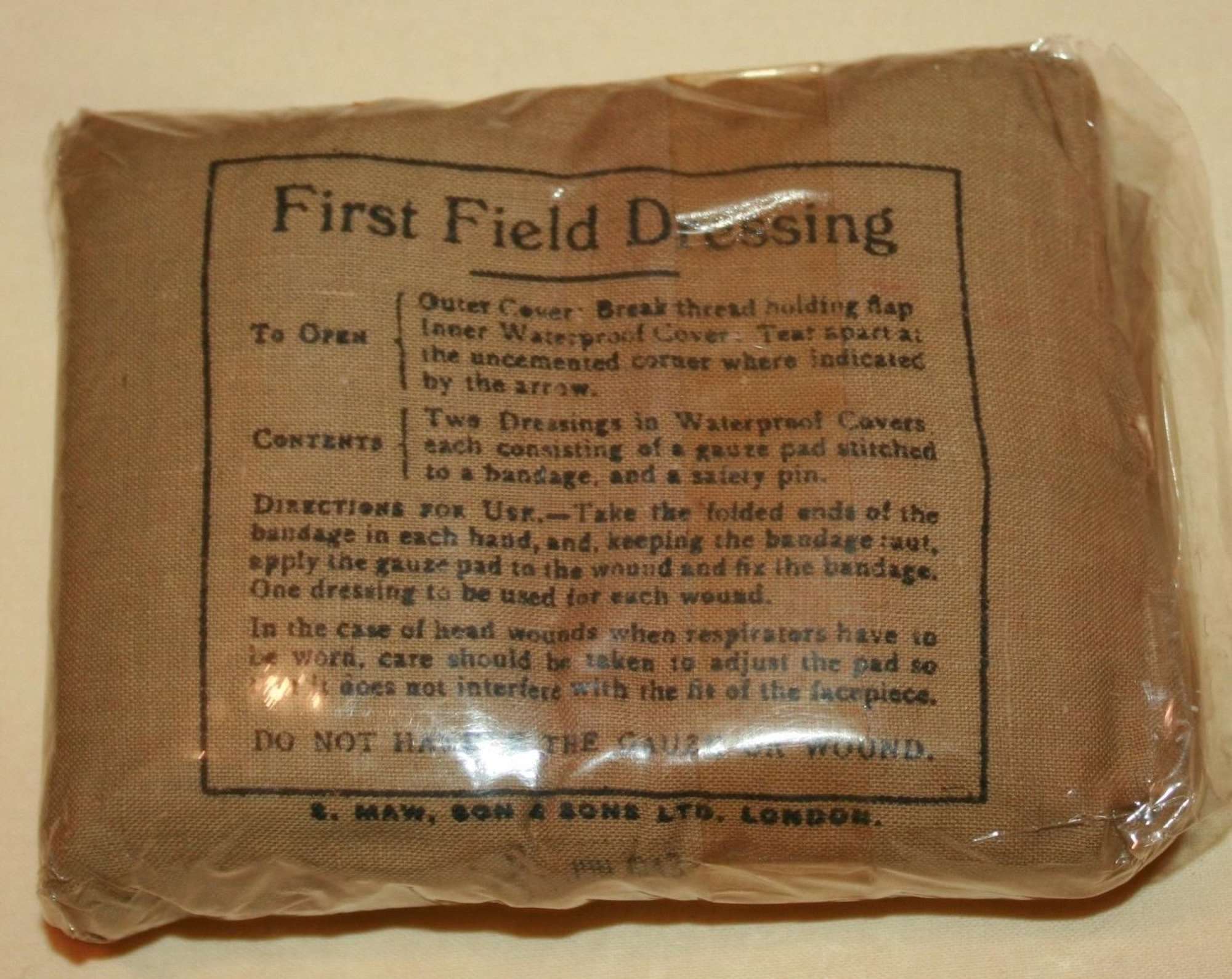 A 1943 DATED 1ST FIELD DRESSING IN CELLOPHANE