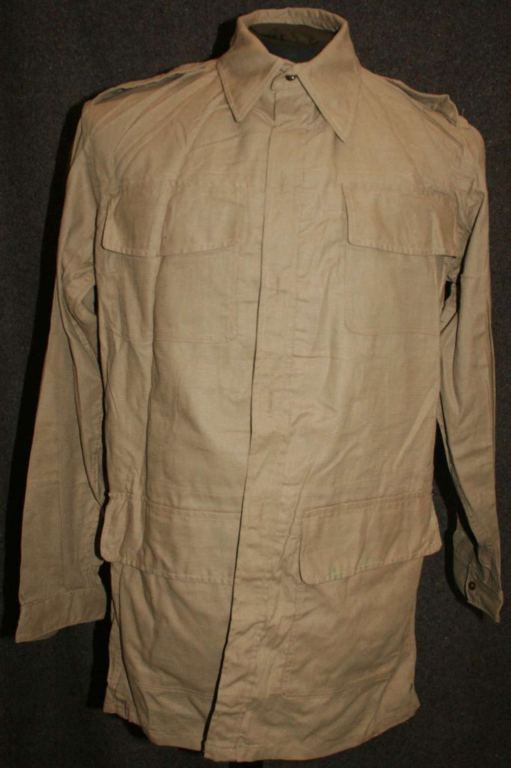 A 1943 DATED SHIRT BUSH SIZE 4