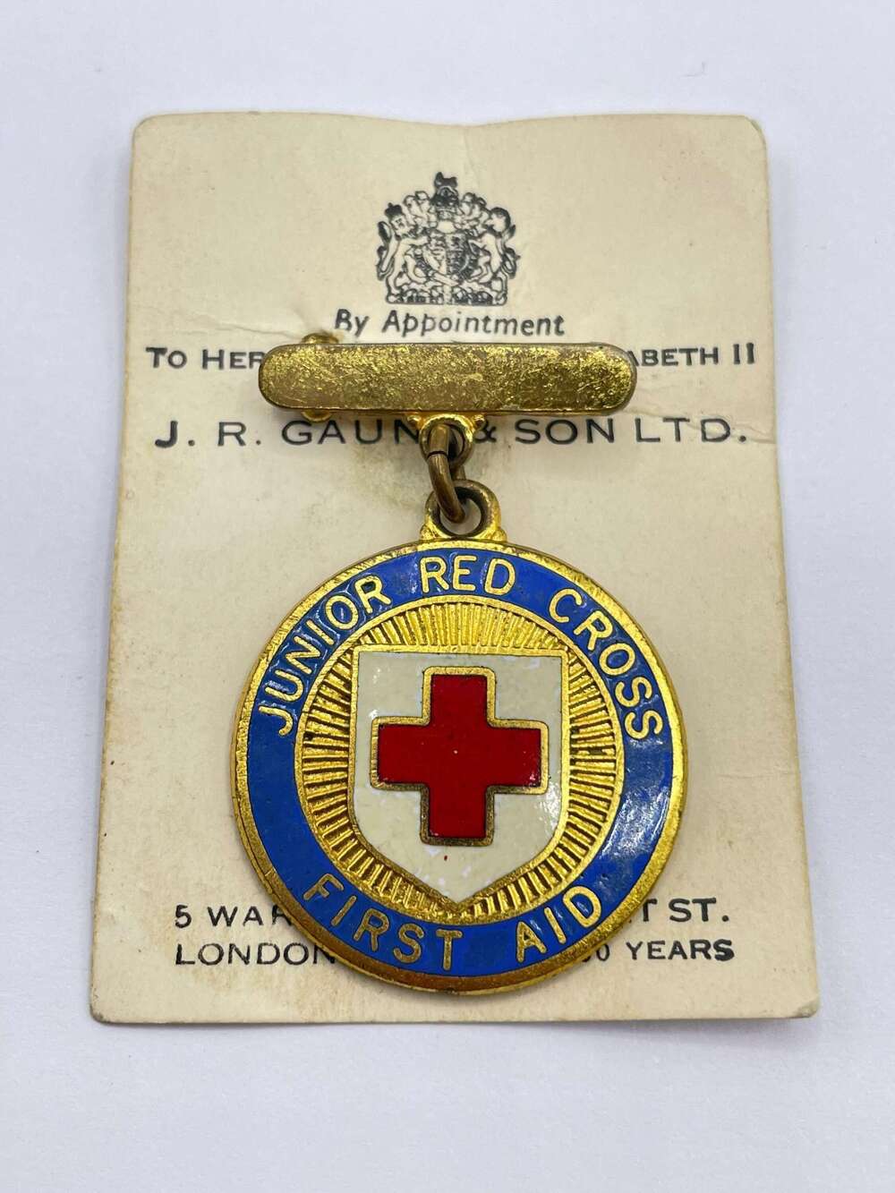 Post WW2 British Red Cross Junior Red Cross First Aid Badge With Card Backing