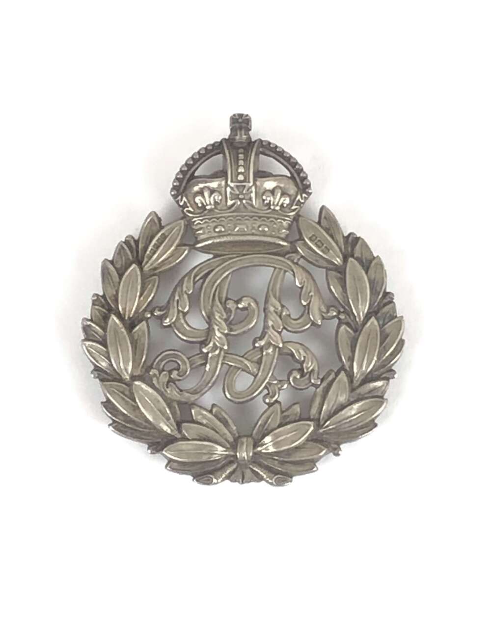 Indian Police 1938 HM silver pouch badge by Gaunt