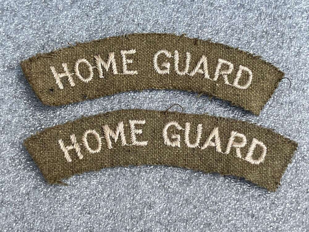 87) Good Original Uniform Removed Home Guard Woven Shoulder Title Pair