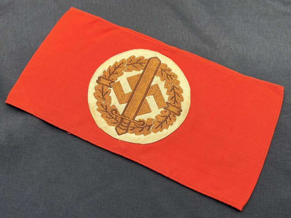 AUTHENTIC WWII GERMAN THIRD REICH SA SPORTS OFFICAL ARMBAND WITH RZM LABEL.