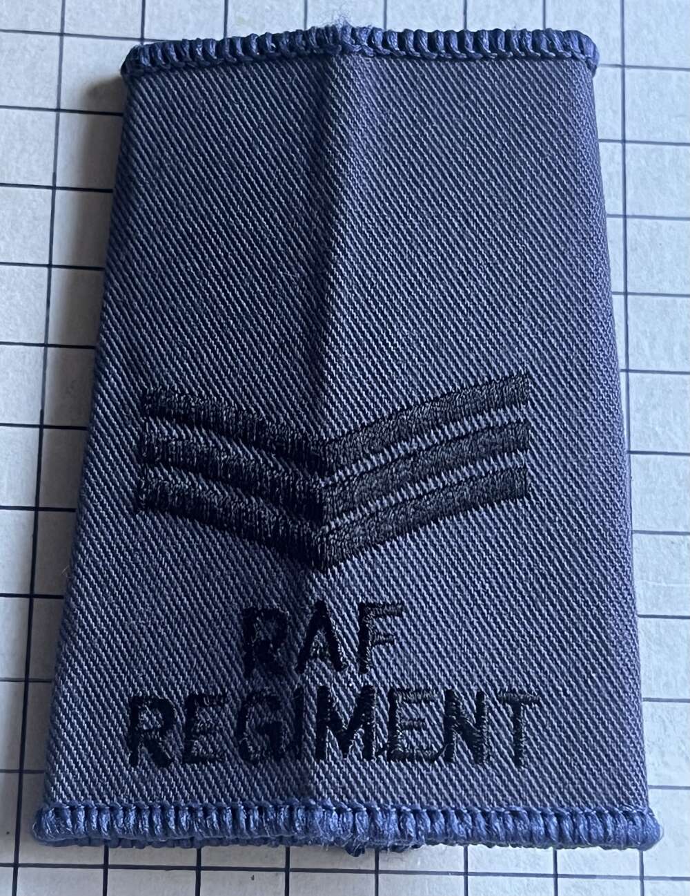 Royal Air Force (RAF) Regiment Sergeant (Sgt) Rank Slide Slip-On Badge