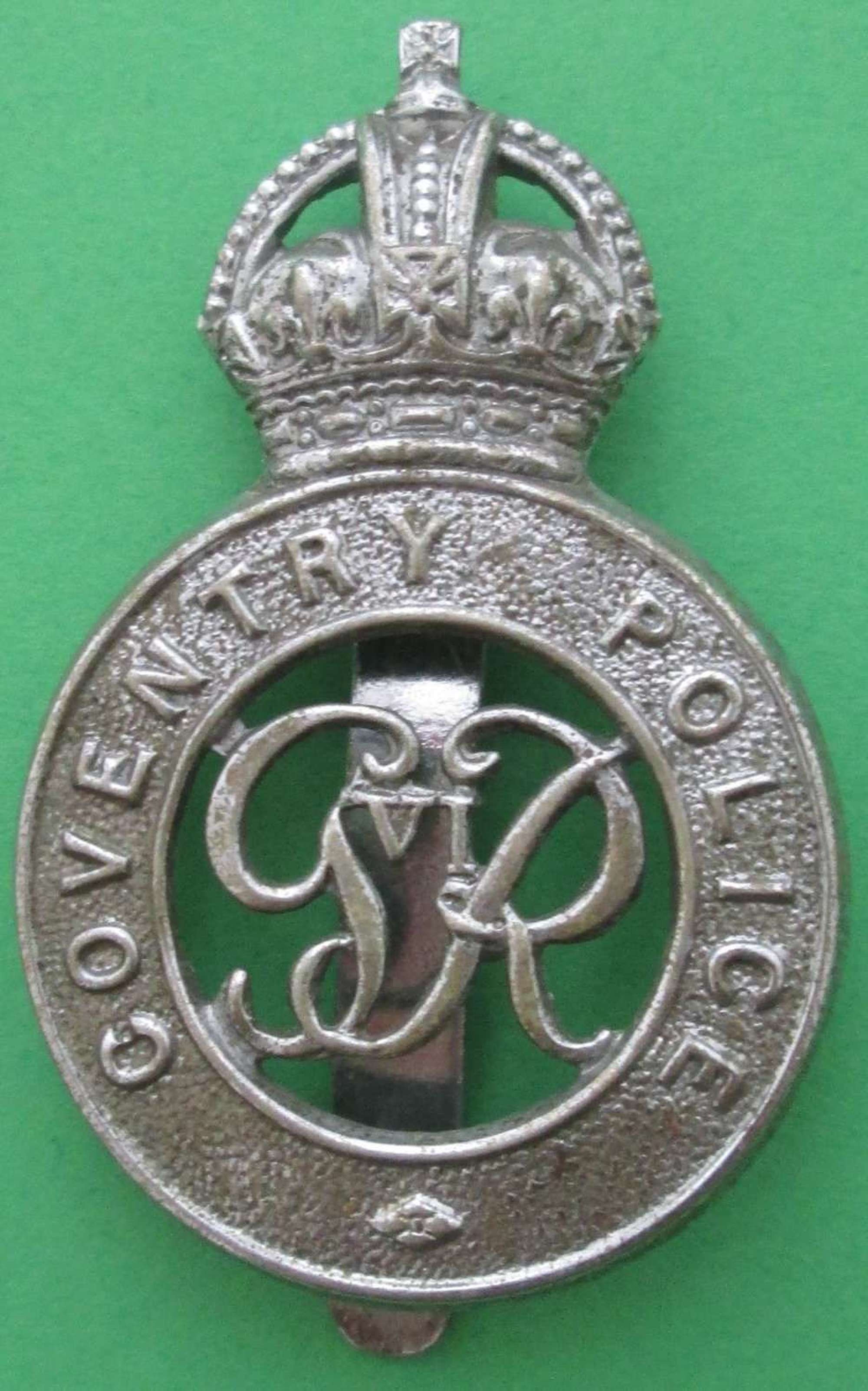 A COVENTRY POLICE CAP BADGE