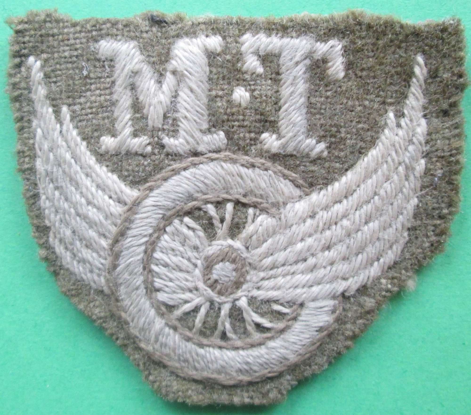 A GOOD EARLY WELL MADE EXAMPLE OF THE MT DRIVERS ARM BADGE
