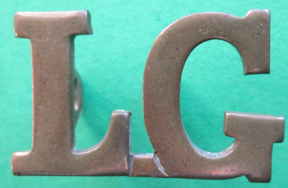 A LARGE LETTERING LIFEGUARDS SHOULDER TITLE