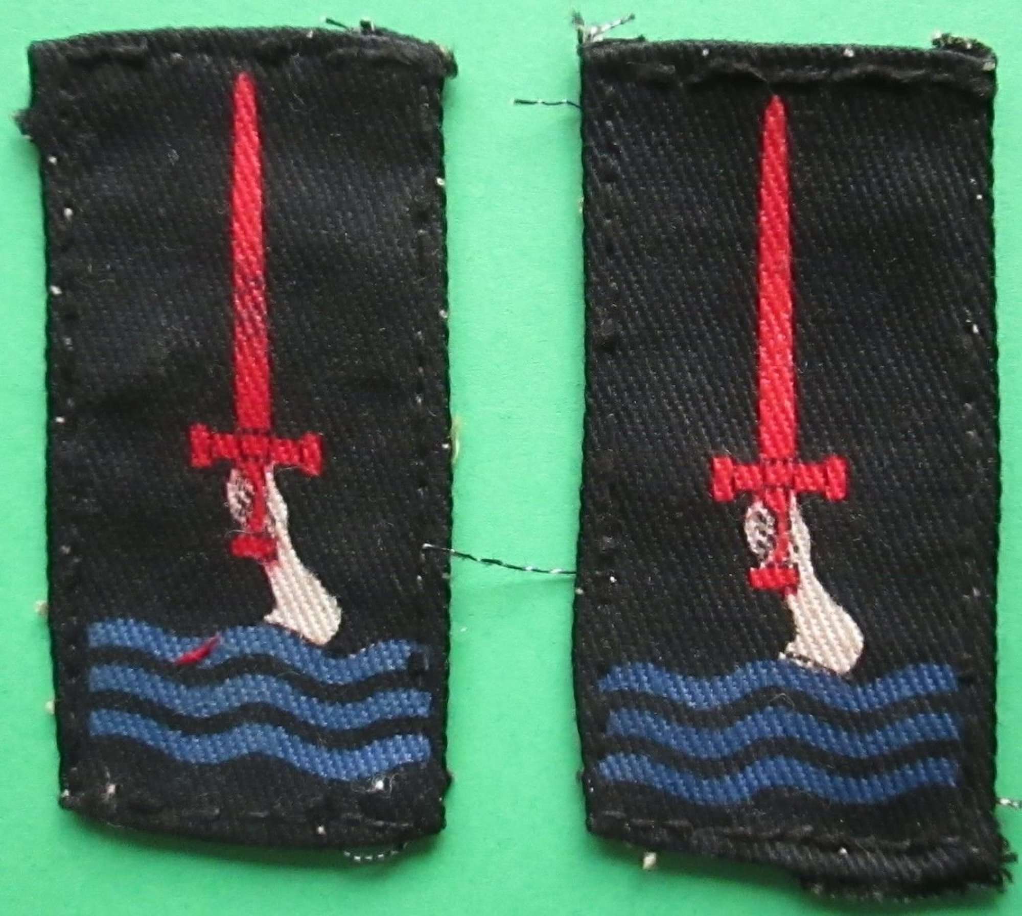 A PAIR OF 77TH DIVISION FORMATION PATCHES
