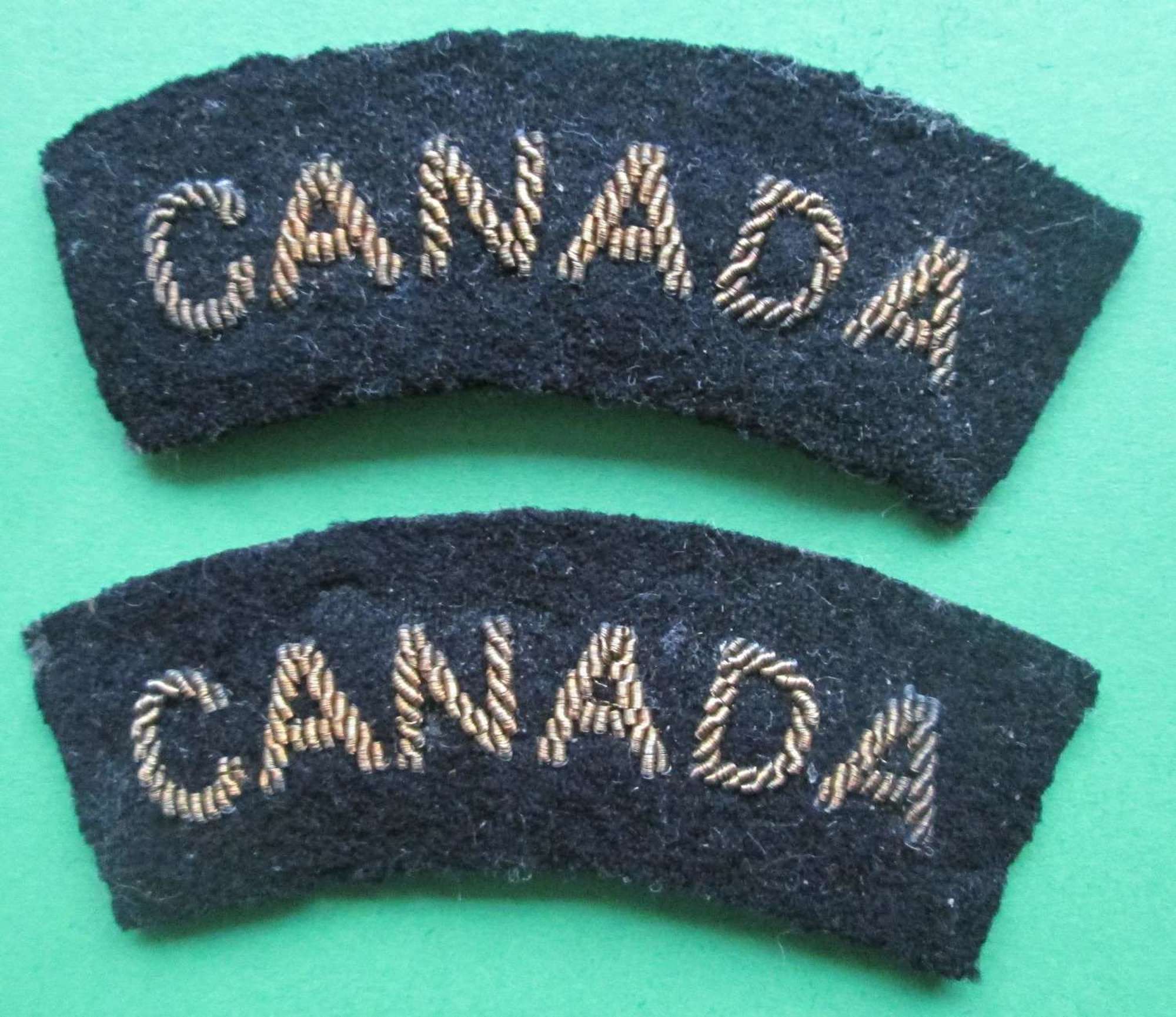 A PAIR OF BULLION WIRE CANADA SHOULDER TITLES
