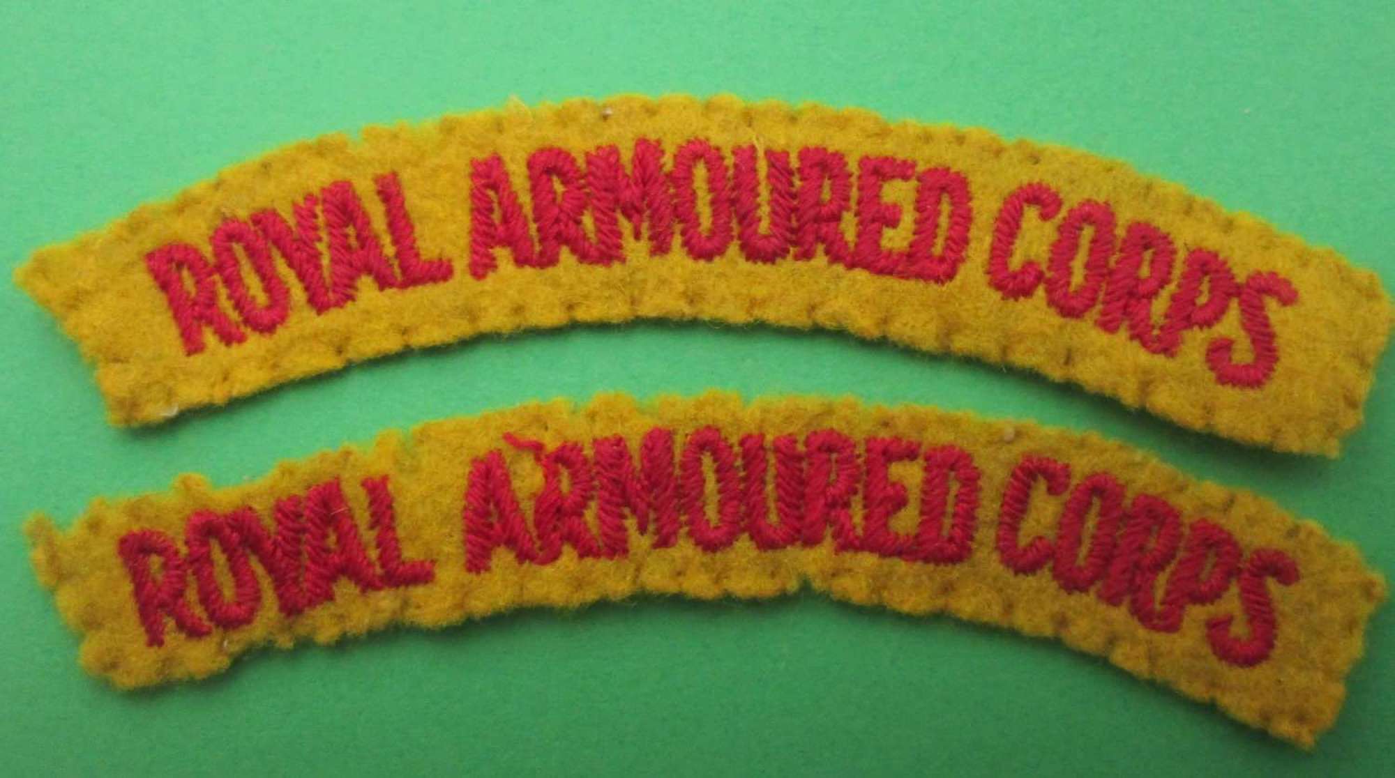 A PAIR OF ROYAL ARMOURED CORPS SHOULDER TITLES