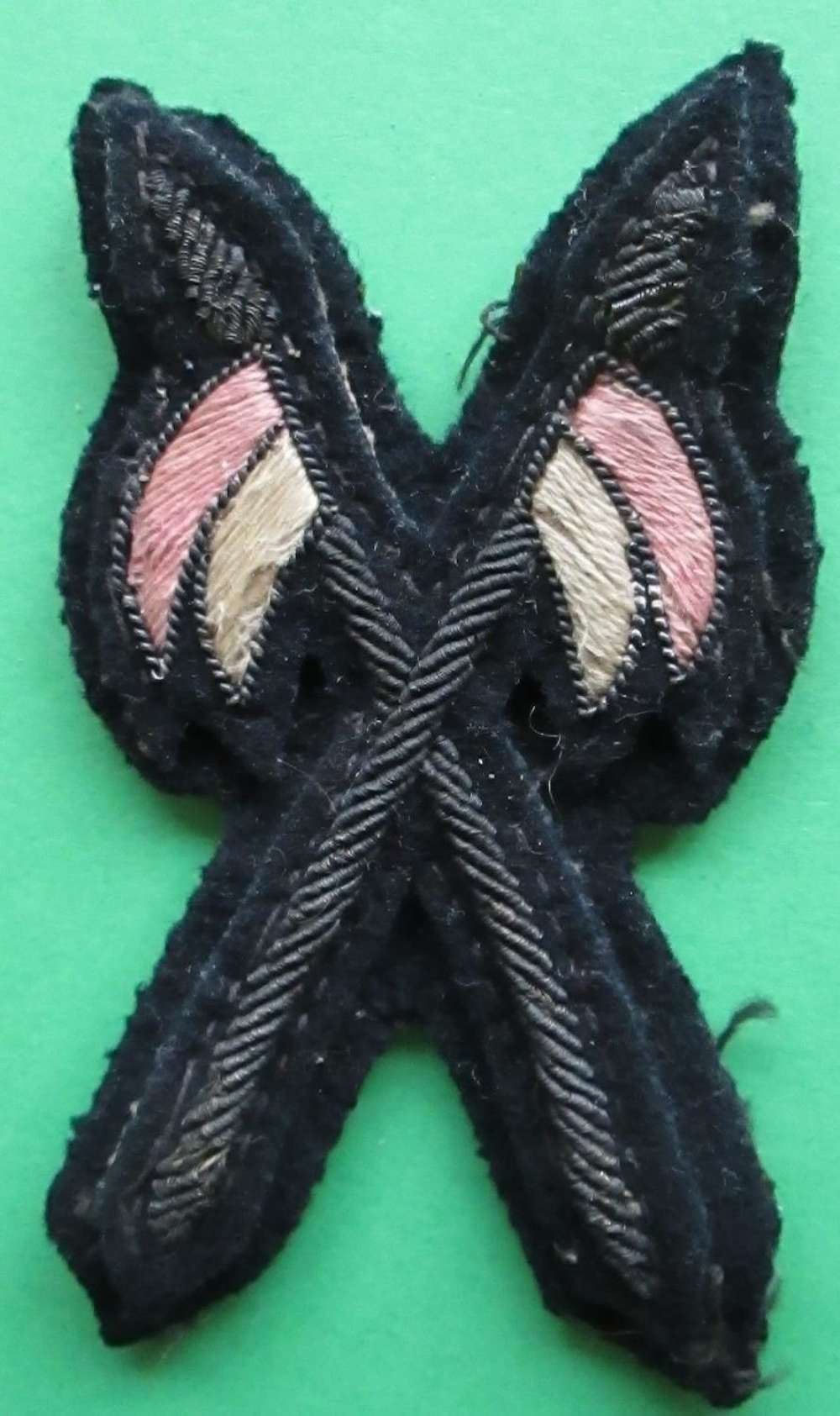 A PRE WWI CROSSED LANCERS ARM BADGE