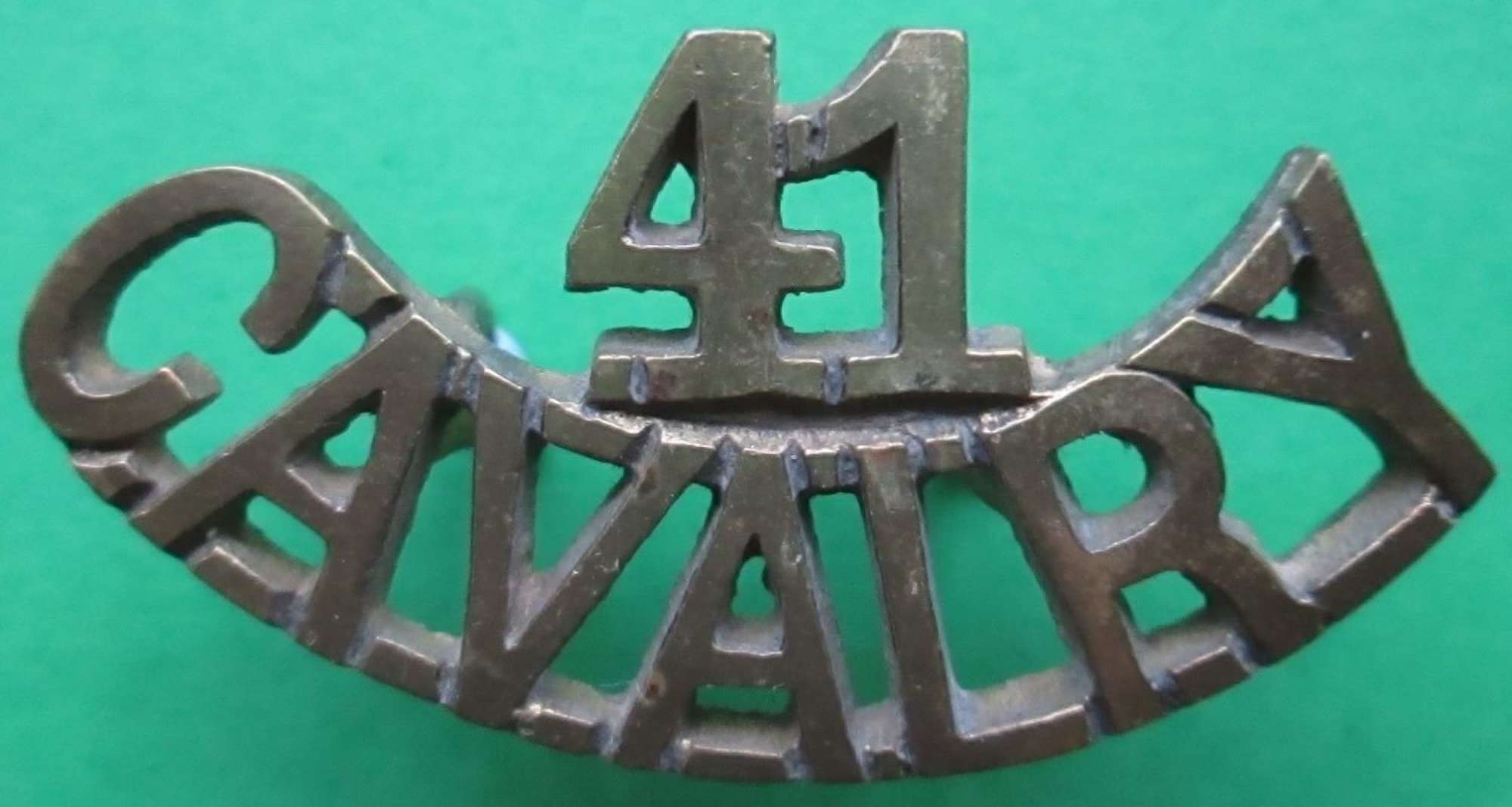 A RARE WWI INDIAN 41st CAVALRY SHOULDER TITLE