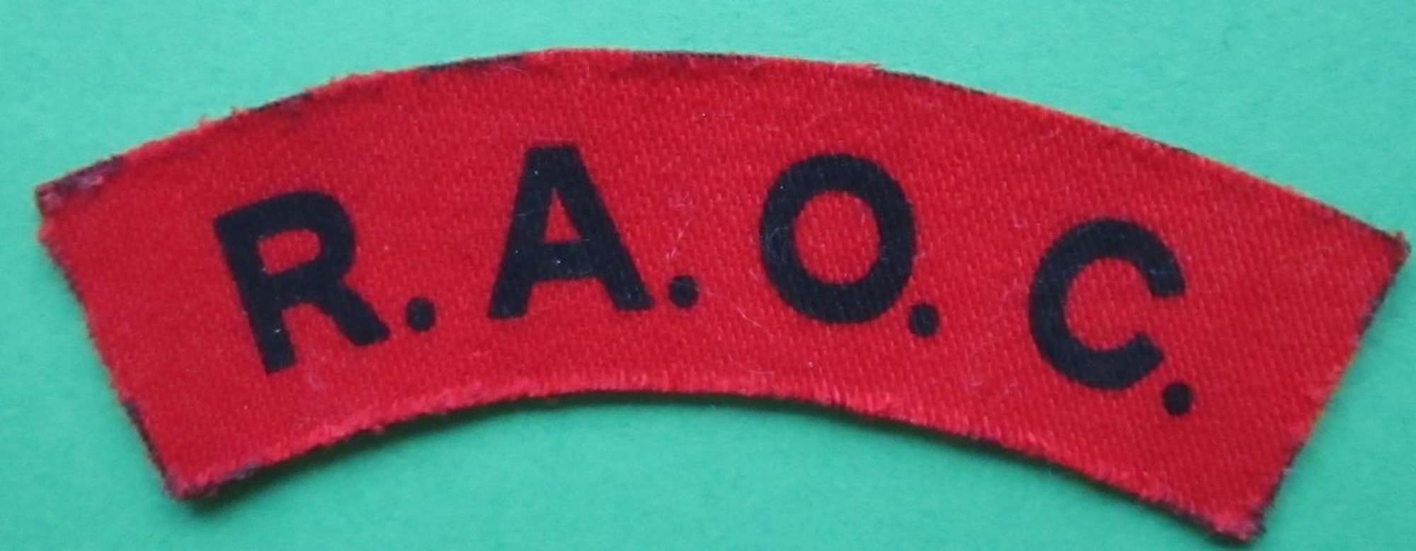 A ROYAL ARMY ORDNANCE CORPS SHOULDER TITLE