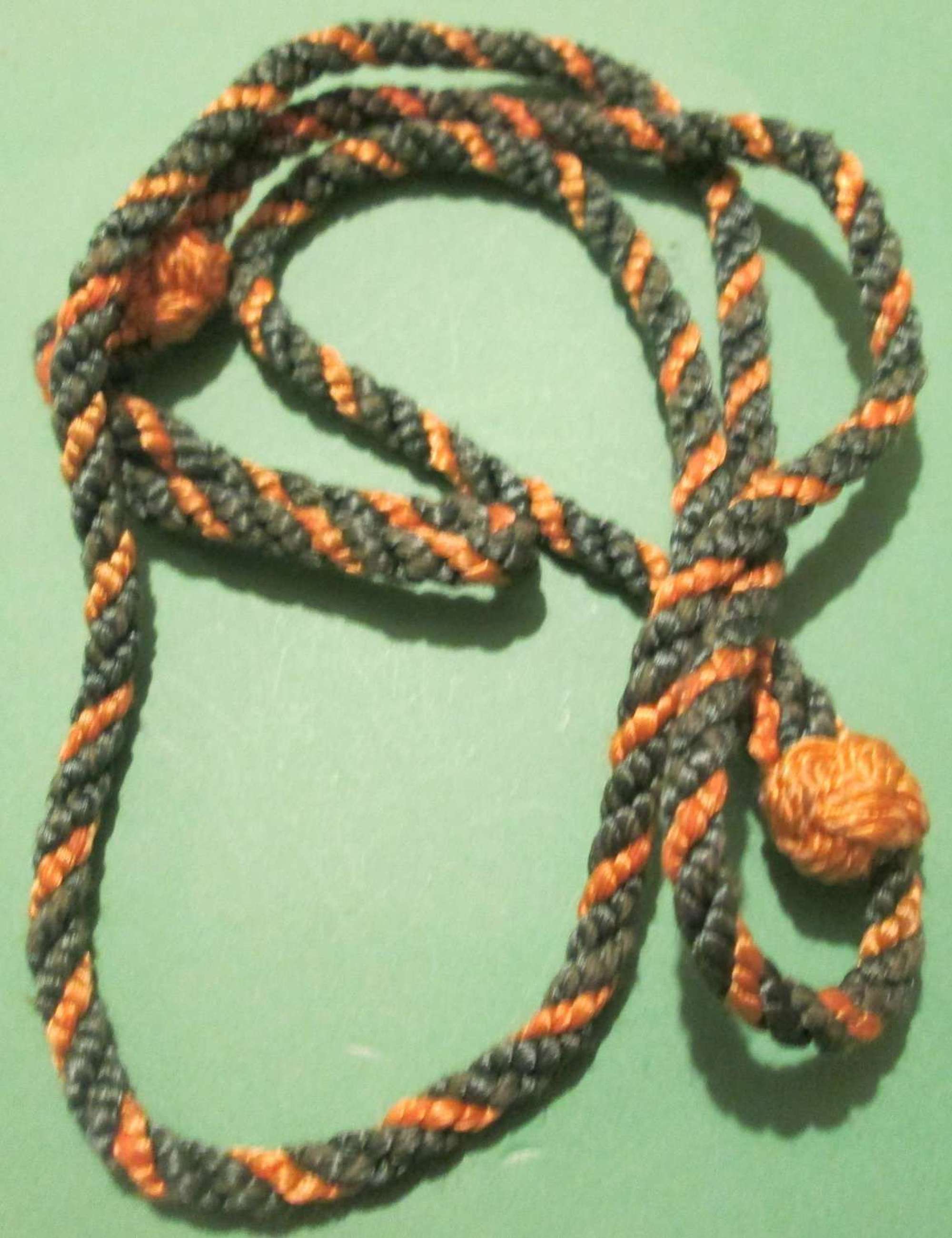 A SCARCE WWII RECONNAISSANCE CORPS OFFICERS LANYARD
