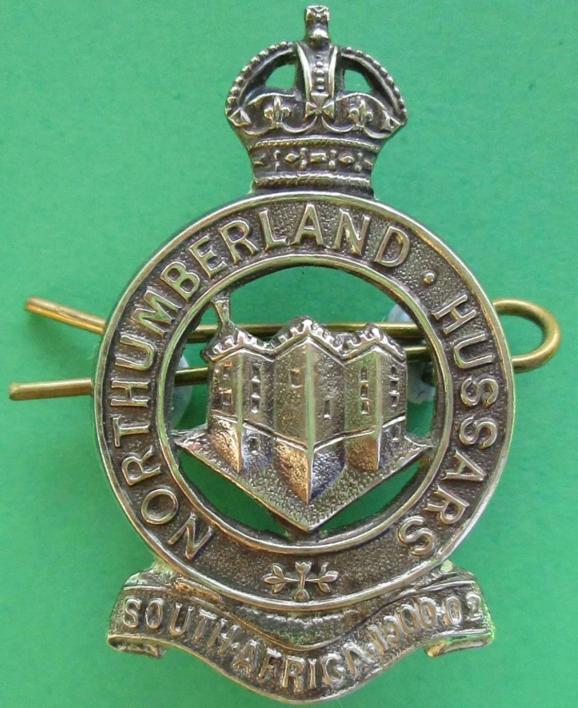 A SILVER PLATED OFFICERS NORTHUMBERLAND HUSSARS CAP BADGE
