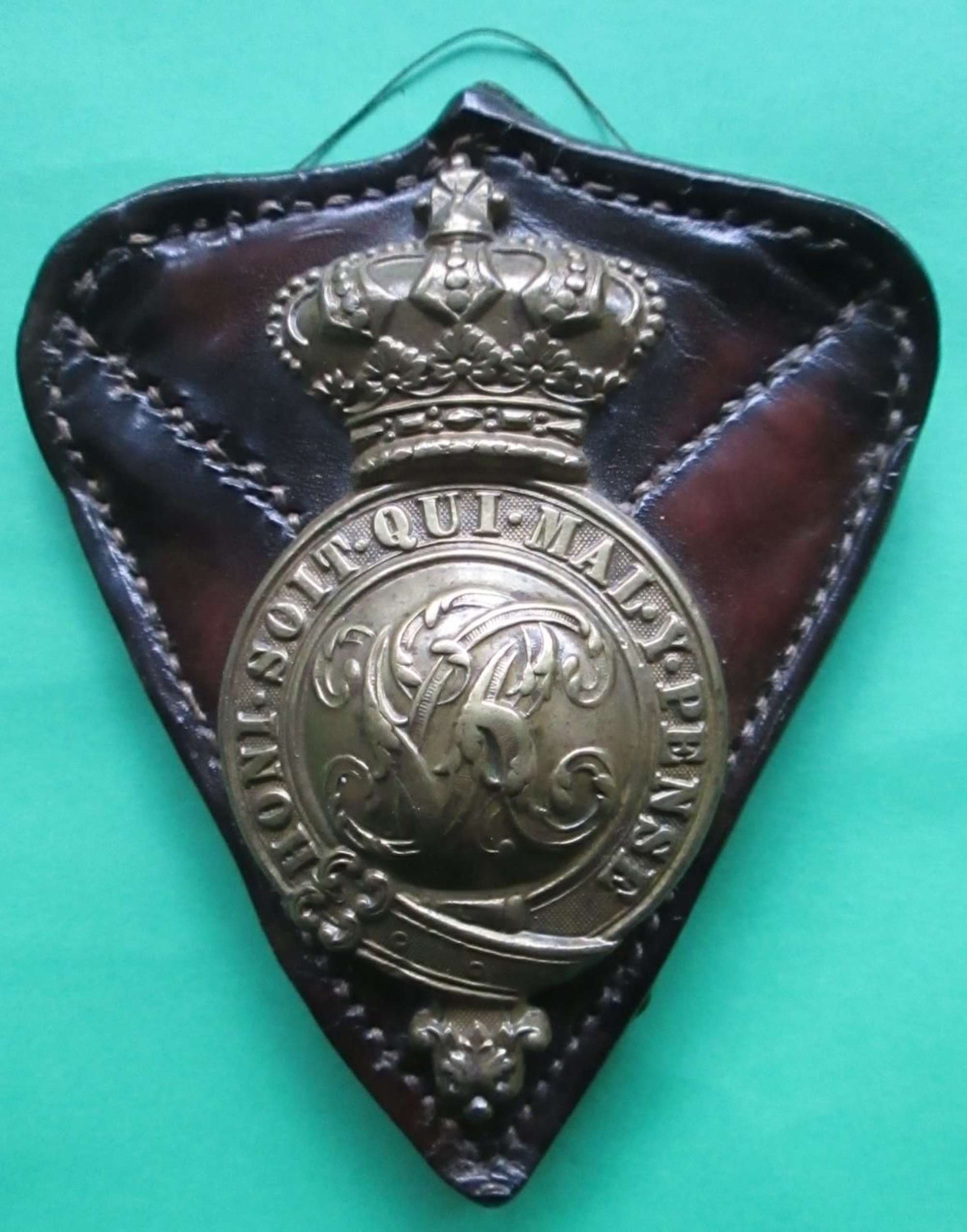 A VICTORIAN HORSE BREAST PLATE BADGE