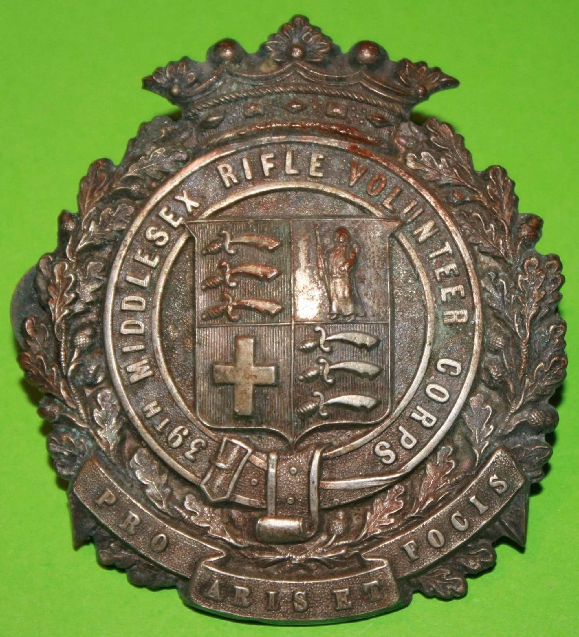A VICTORIAN MIDDLESEX RIFLE VOLUNTEER CORPS SHAKO BADGE