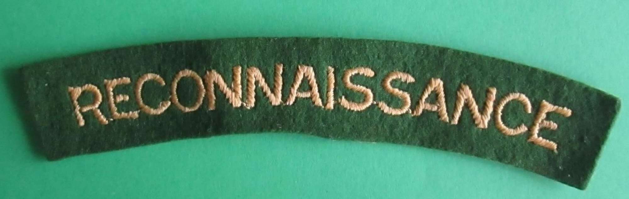 A WWII EMBROIDERED RECONNAISSANCE CORPS SHOULDER TITLE