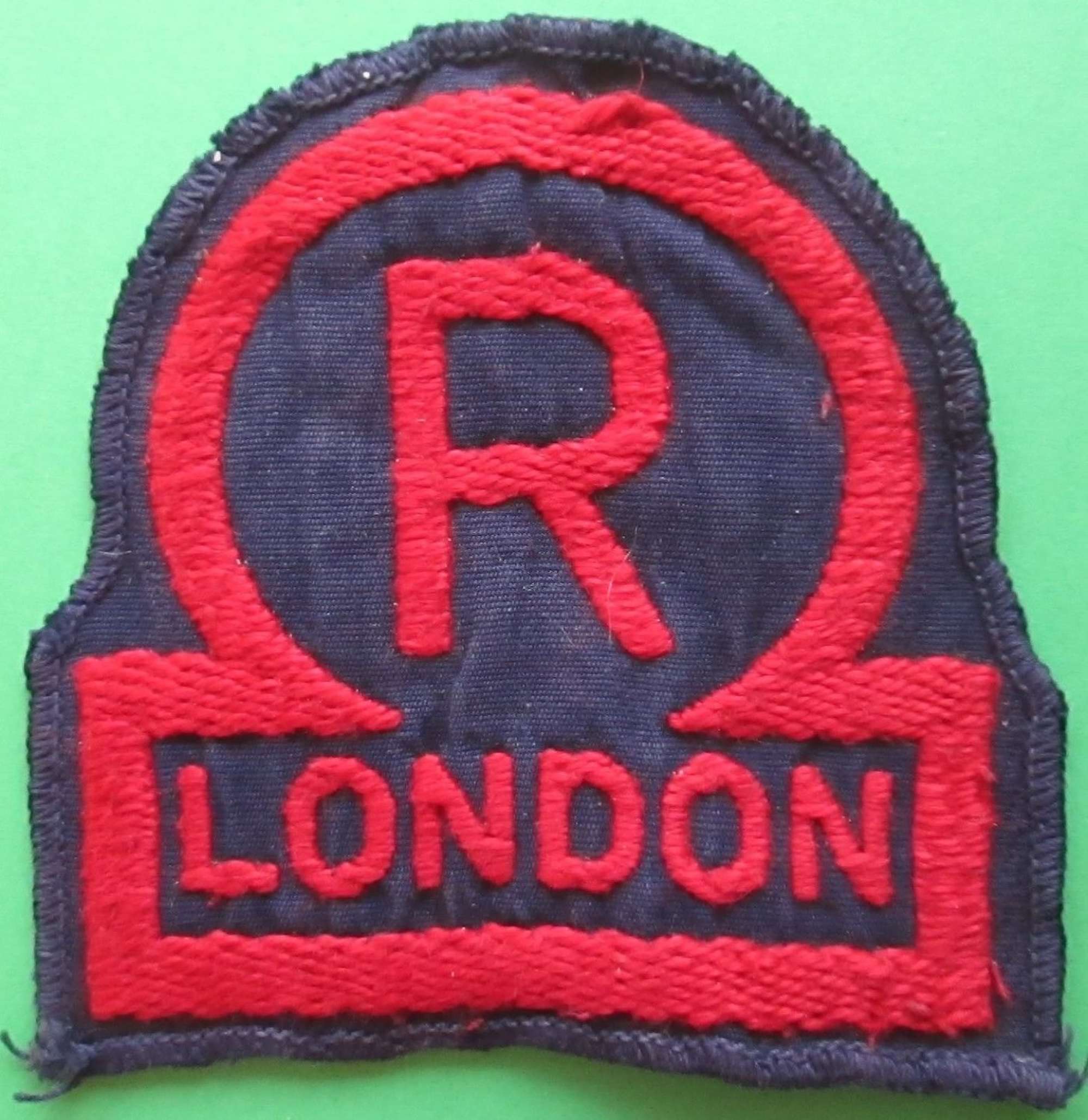 A WWII LONDON NATIONAL FIRE SERVICE RESERVE BREAST BADGE