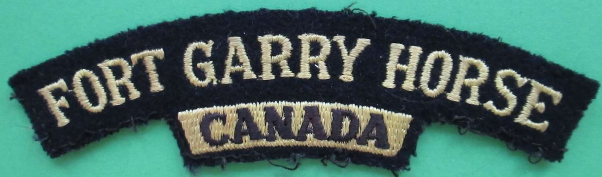 A WWII PERIOD FORT GARRY HORSE CANADIAN SHOULDER TITLE