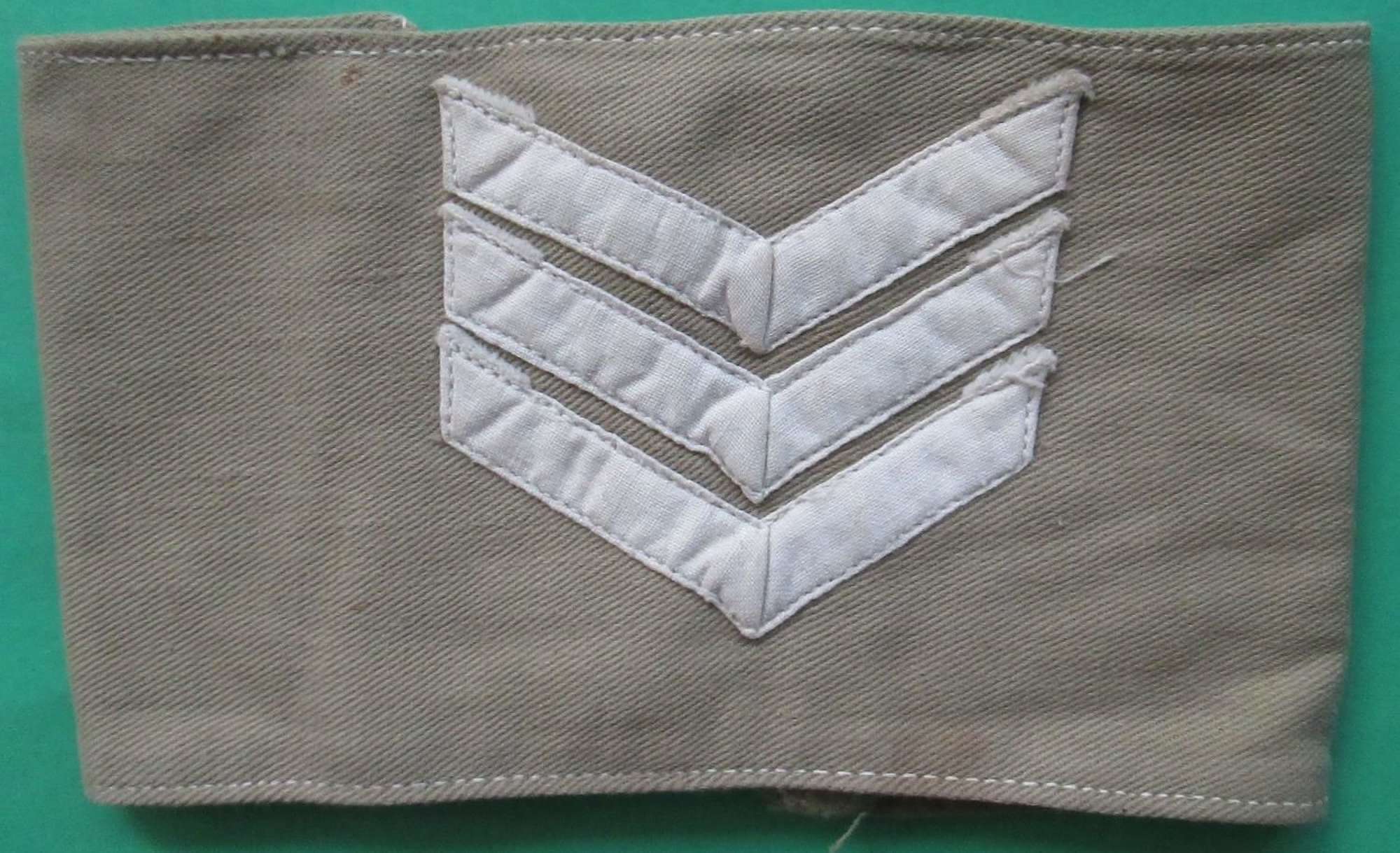 A WWII PERIOD TROPICAL SGTS ARM BAND