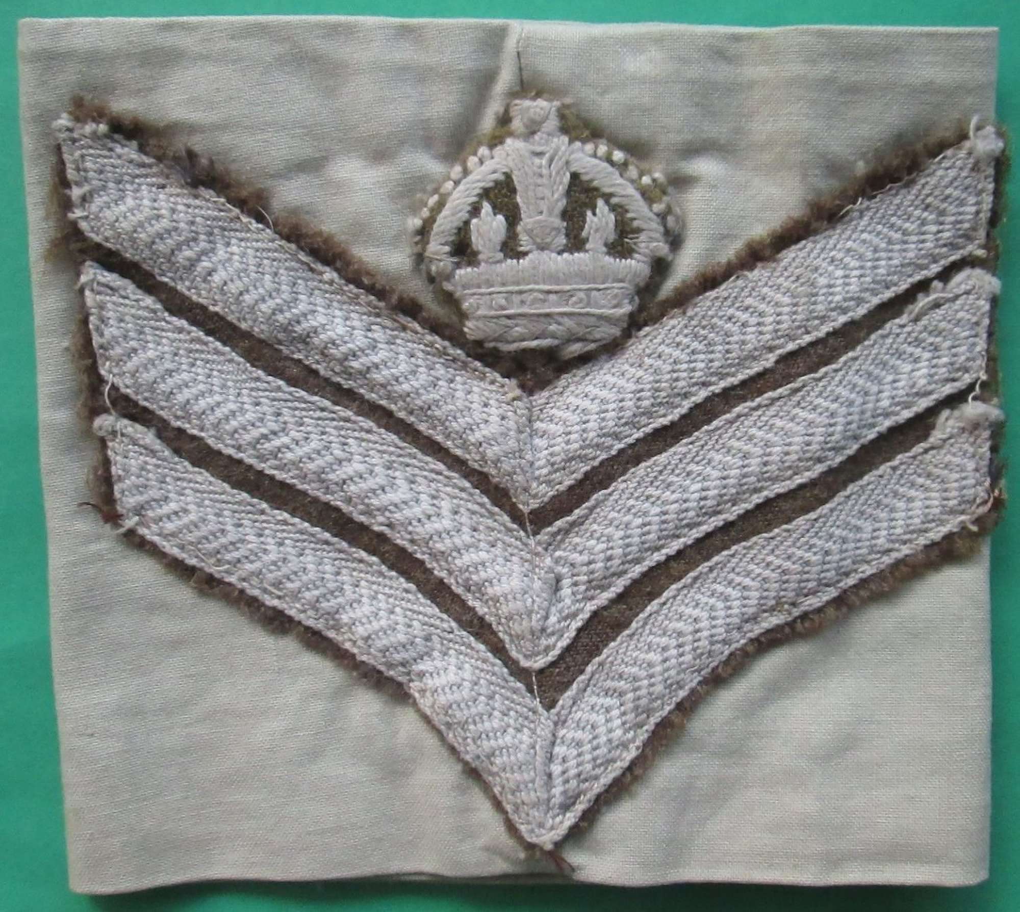 A WWII TROPICAL STAFF SGTS ARM BAND