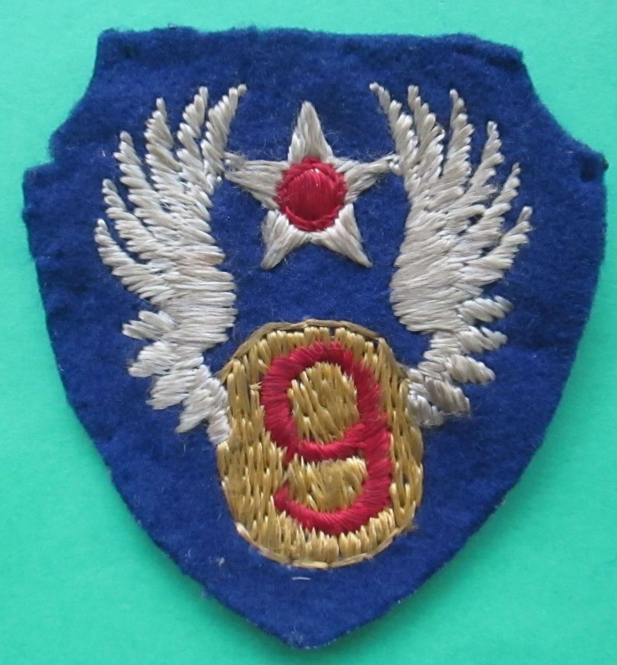 A WWII US 9th ARMY AIR FORCE SHOULDER PATCH BRITISH MADE