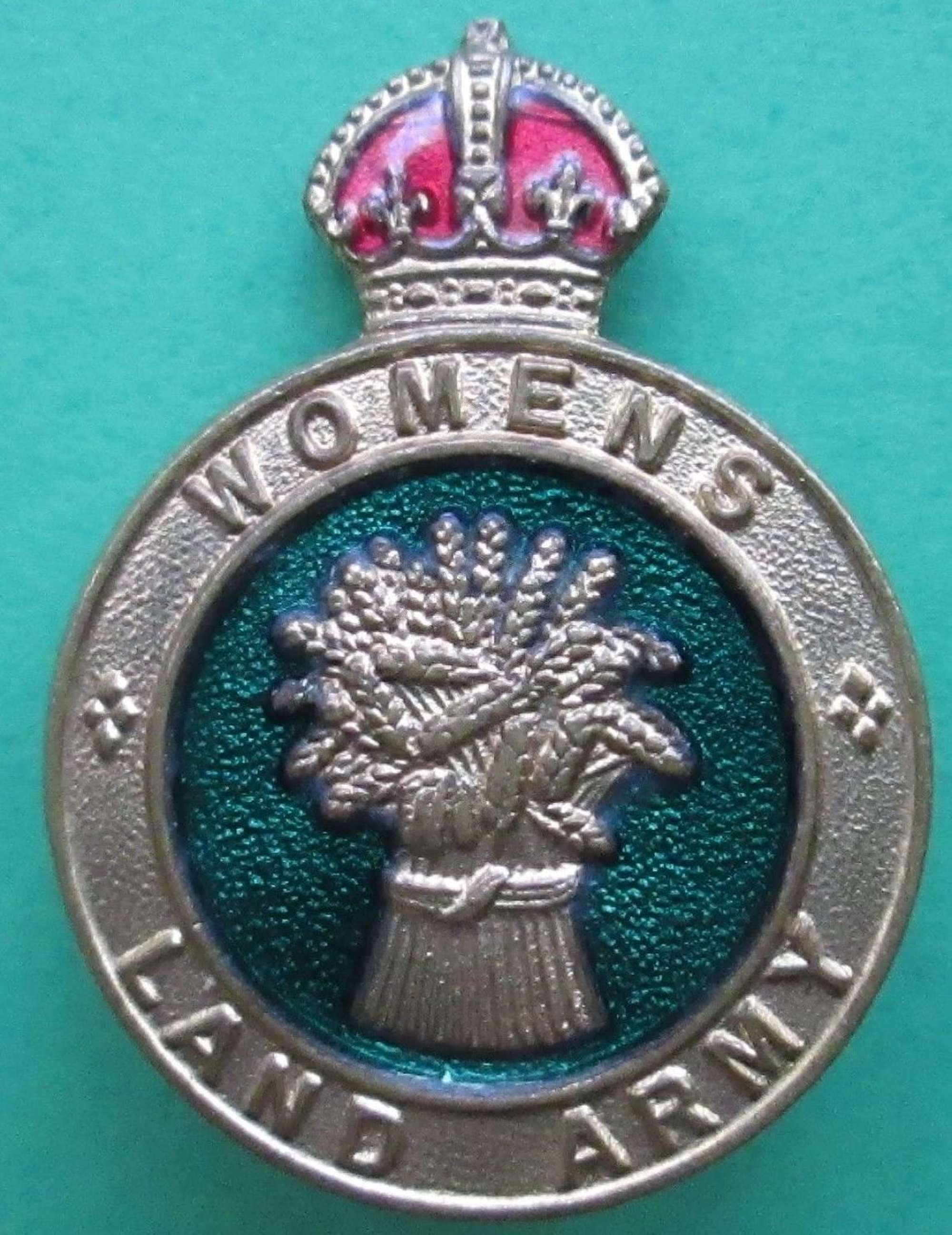 A WOMEN'S LAND ARMY BADGE