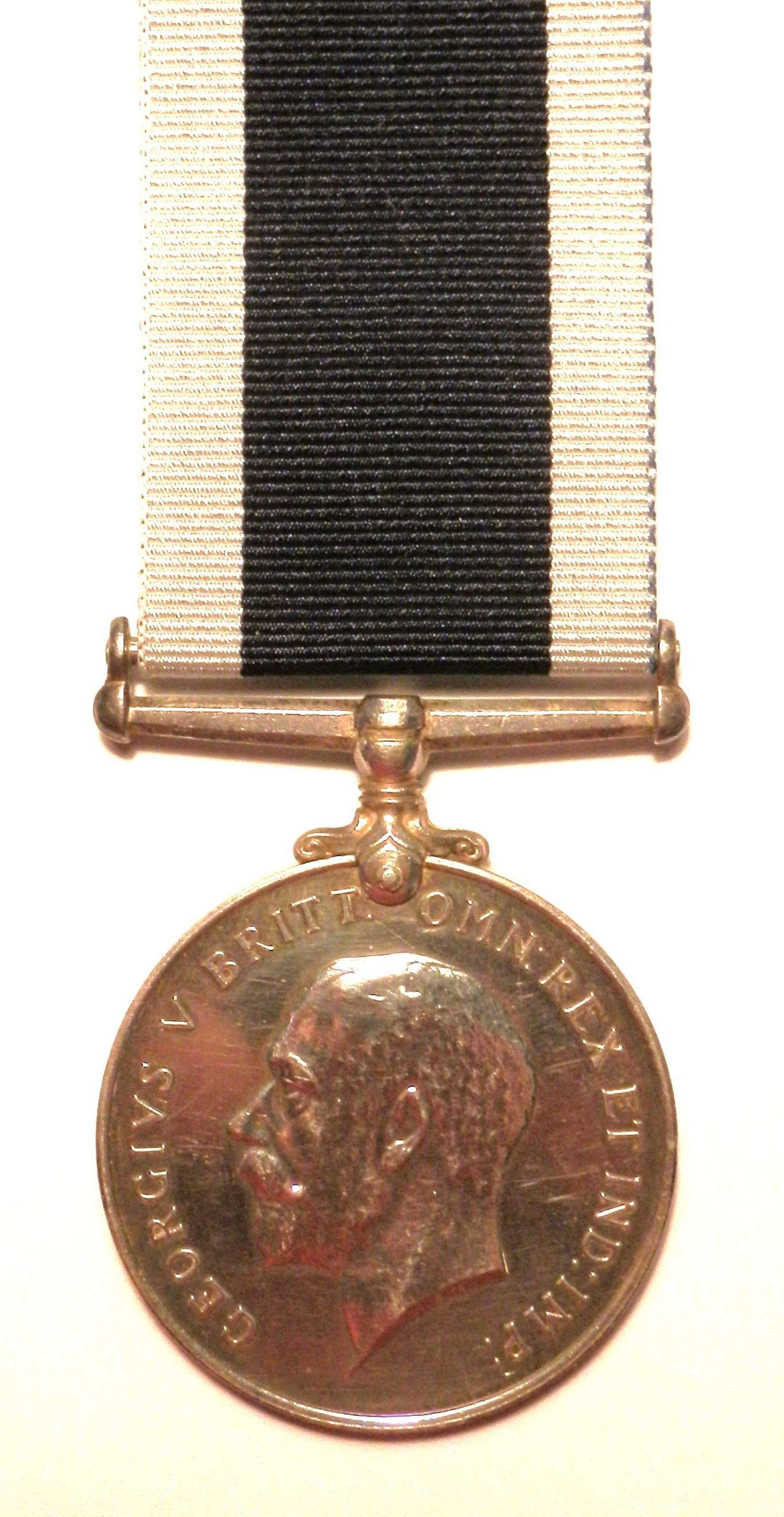 Royal Navy L.S. & G.C. Petty Officer Robert William Holburn. Present a