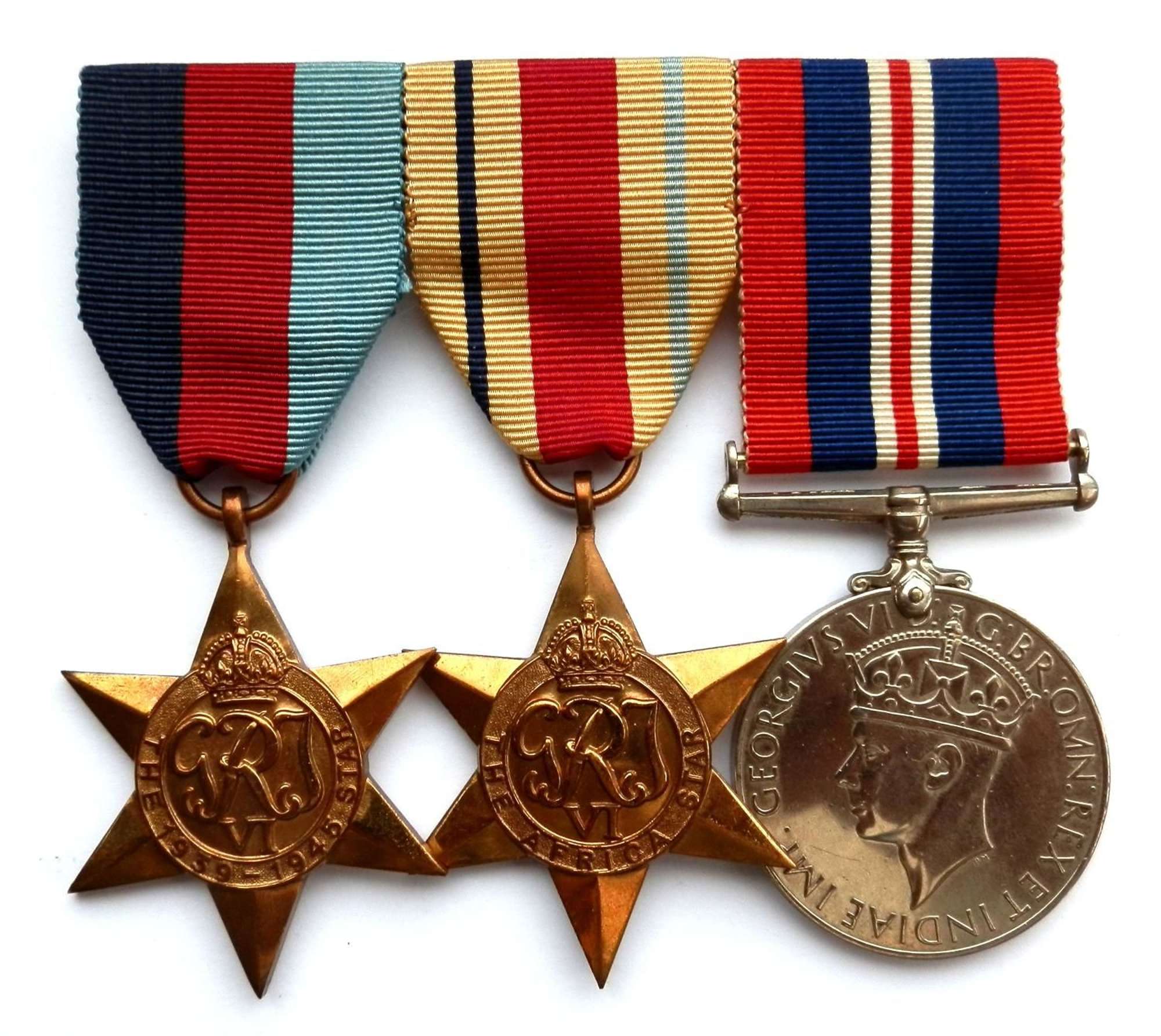 GROUP OF THREE. Un-named Mounted WWII Medal Group.