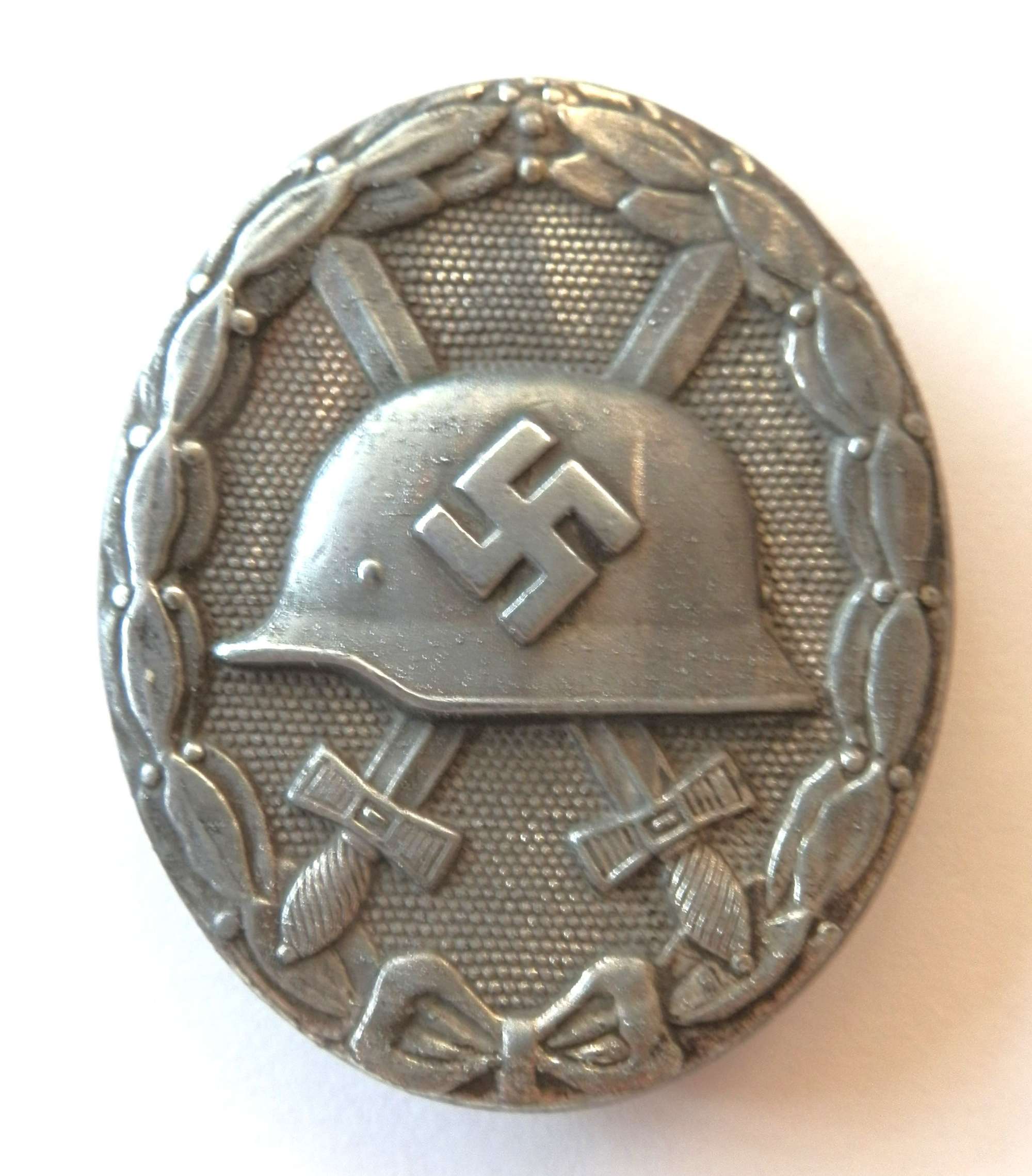 Silver Wound Badge. Marked L/21.