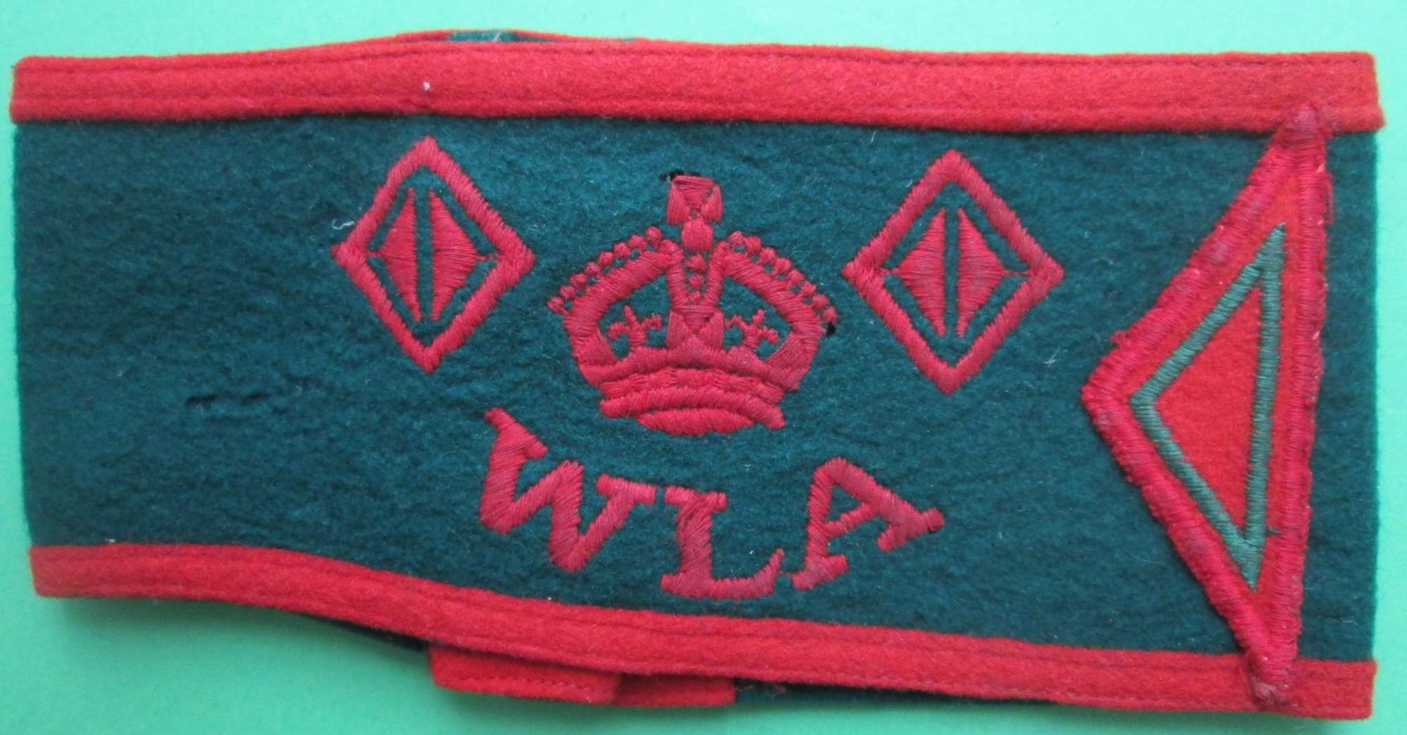 A WWII WOMAN'S LAND ARMY ARMBAND 2.5 YEARS SERVICE EXAMPLE