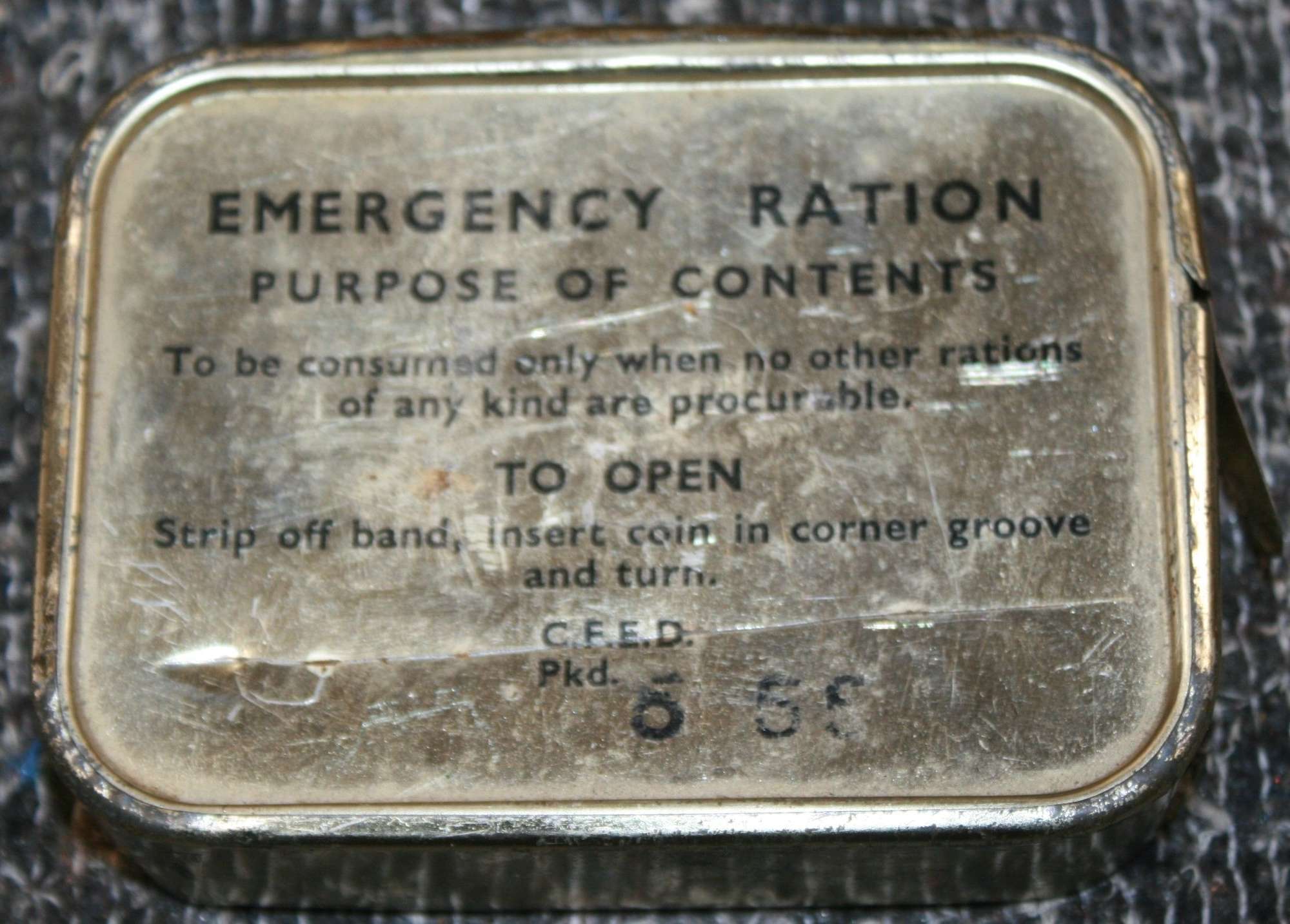 A 1950'S EMERGENCY RATION TIN FULL UNOPENED