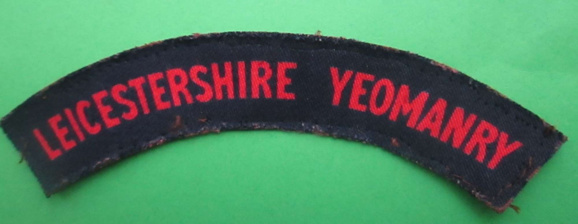 A LEICESTERSHIRE YEOMANRY SHOULDER TITLE