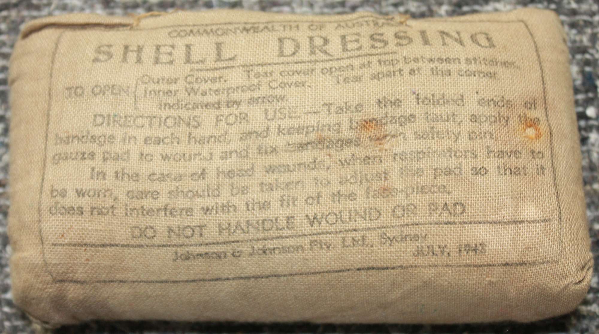 A WWII COMMONWEALTH OF AUSTRALIA SHELL DRESSING