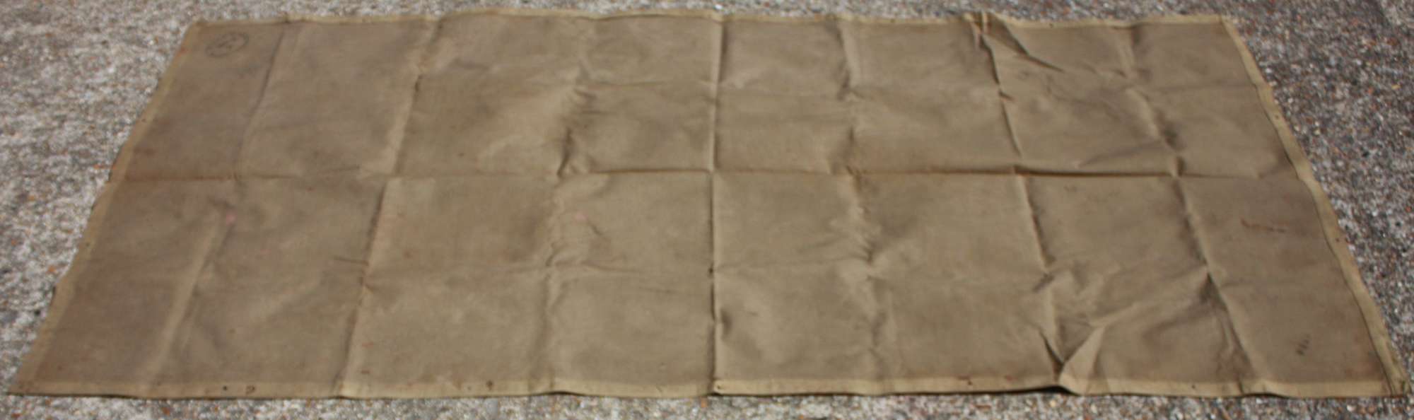 A BRITISH ISSUE 1942 DATED TAN GROUND SHEET
