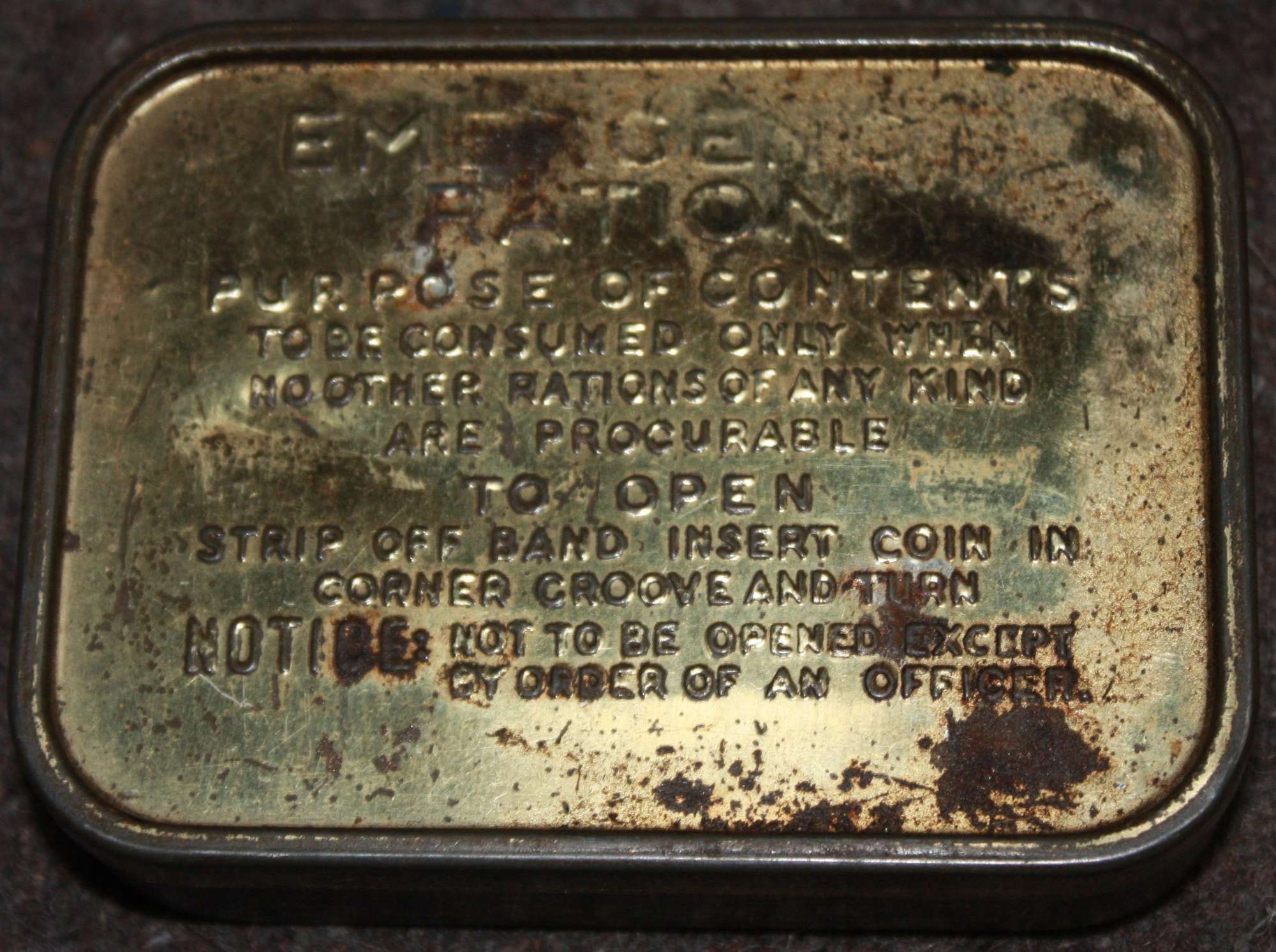 A GOOD USED WWII EMERGENCY RATION TIN
