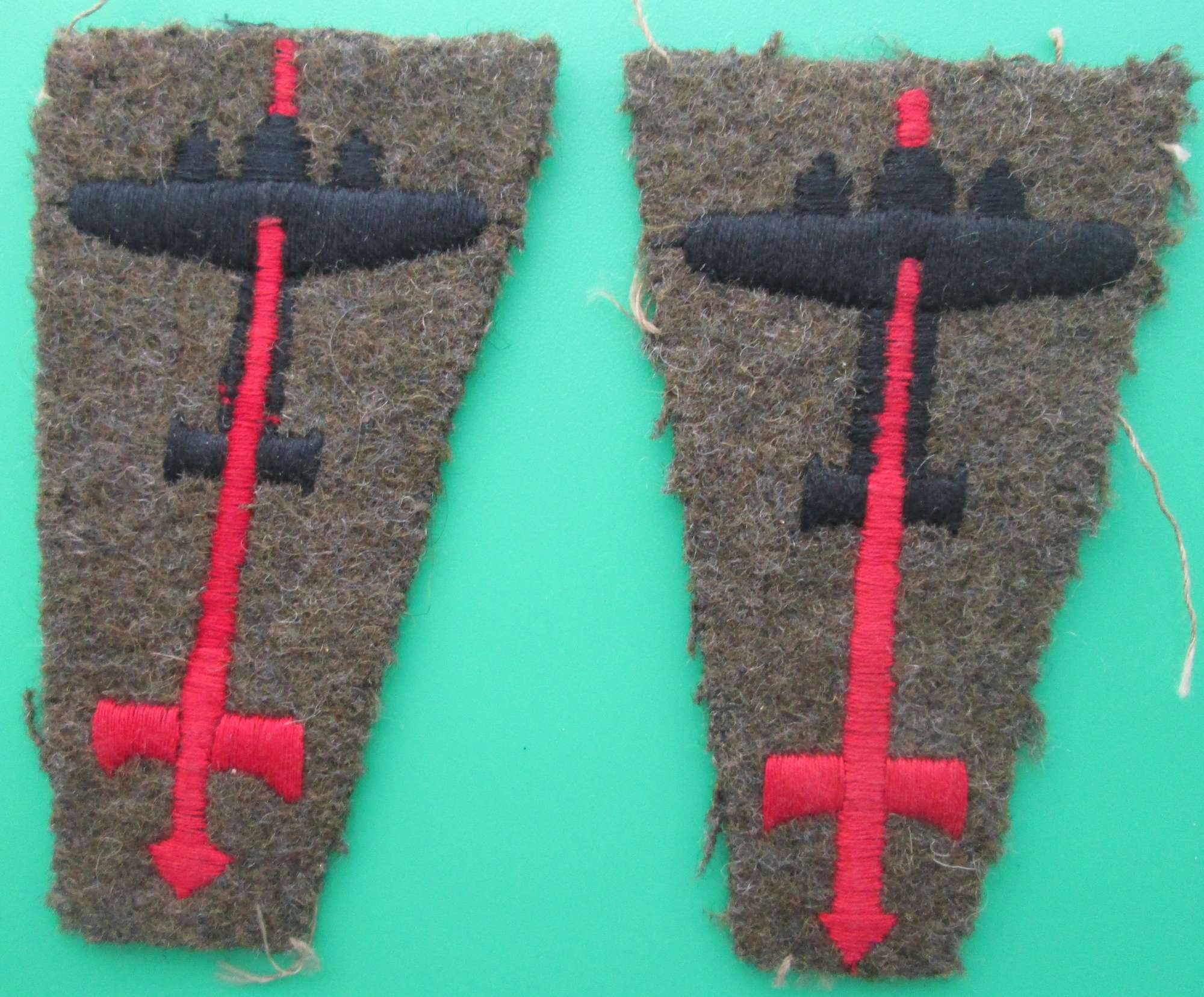 A PAIR OF 1ST ANTI-AIRCRAFT DIVISION FORMATION SIGNS