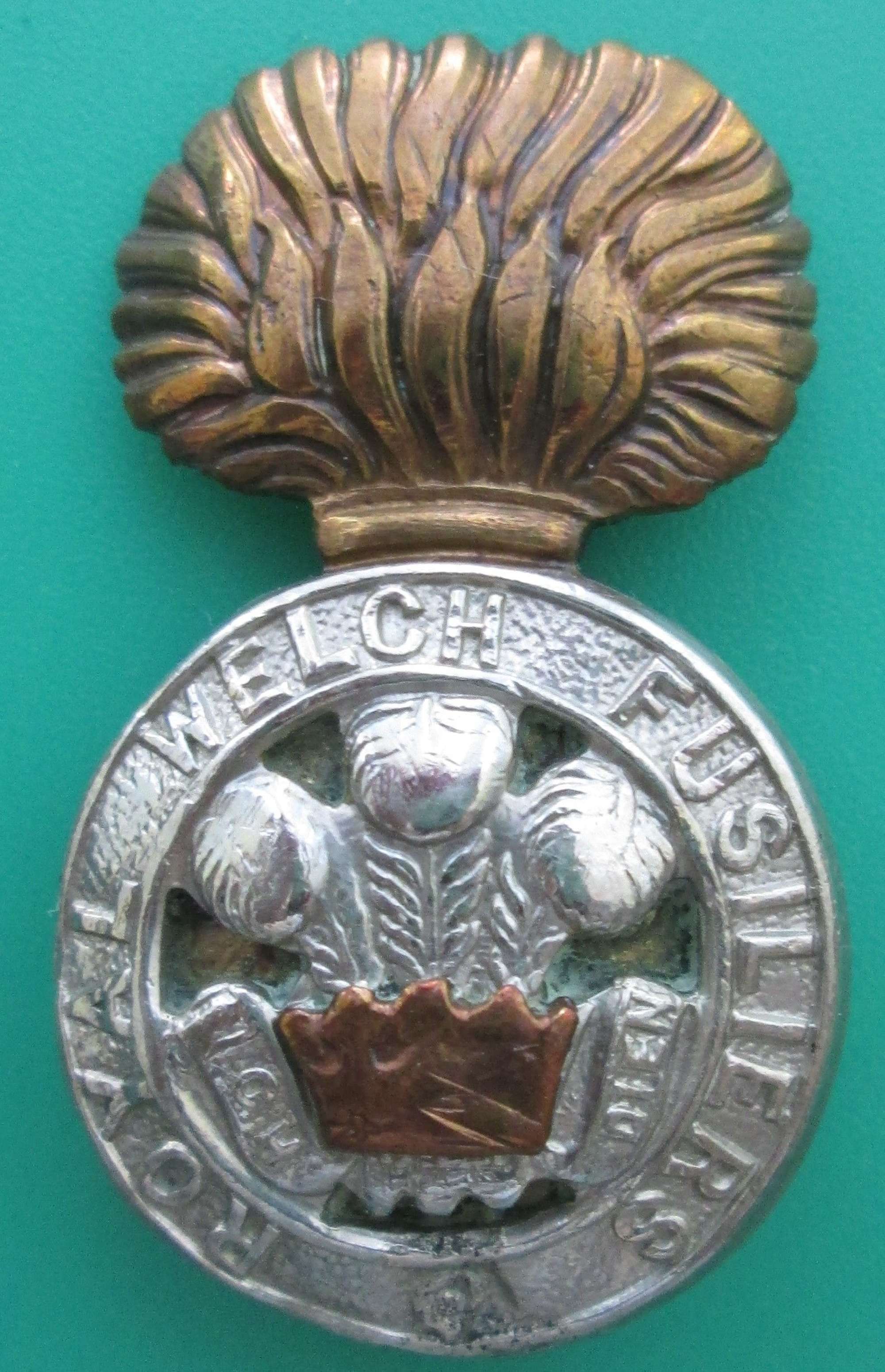 A ROYAL WELCH FUSILIERS CAP BADGE