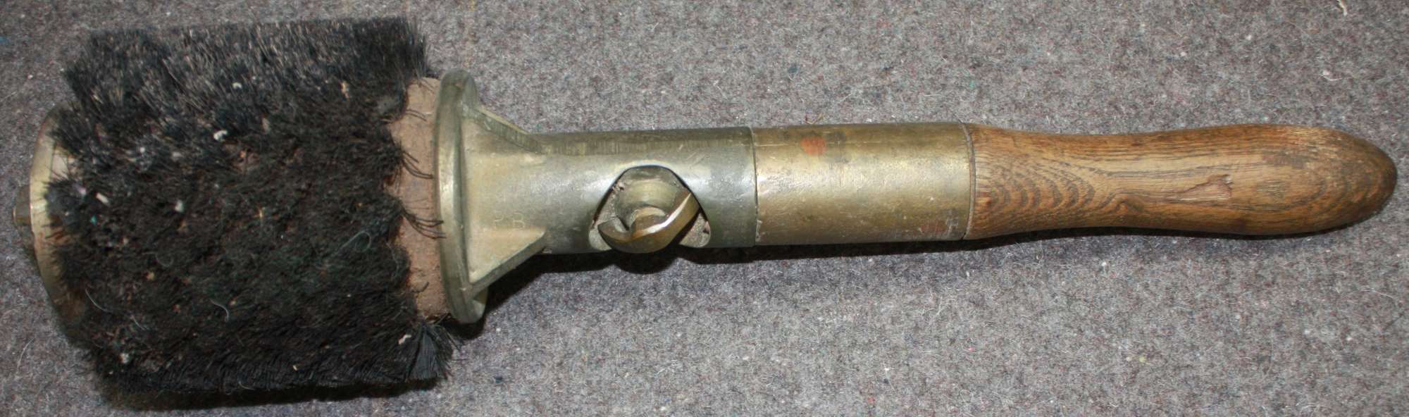 A POST WWII 25 PRD FIELD GUN BARREL BRUSH