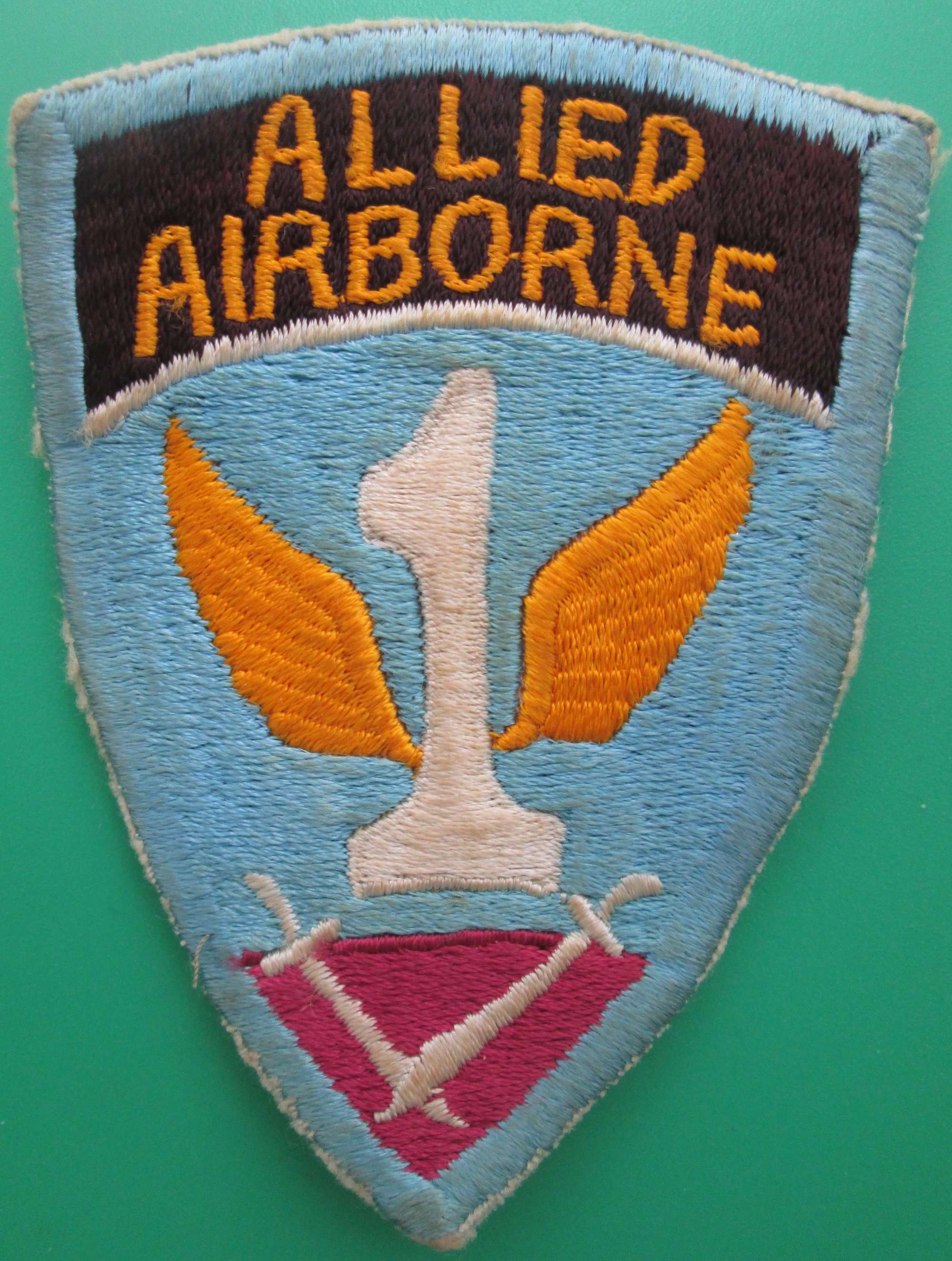 A WWII 1ST ALLIED AIRBORNE US MADE ARM BADGE