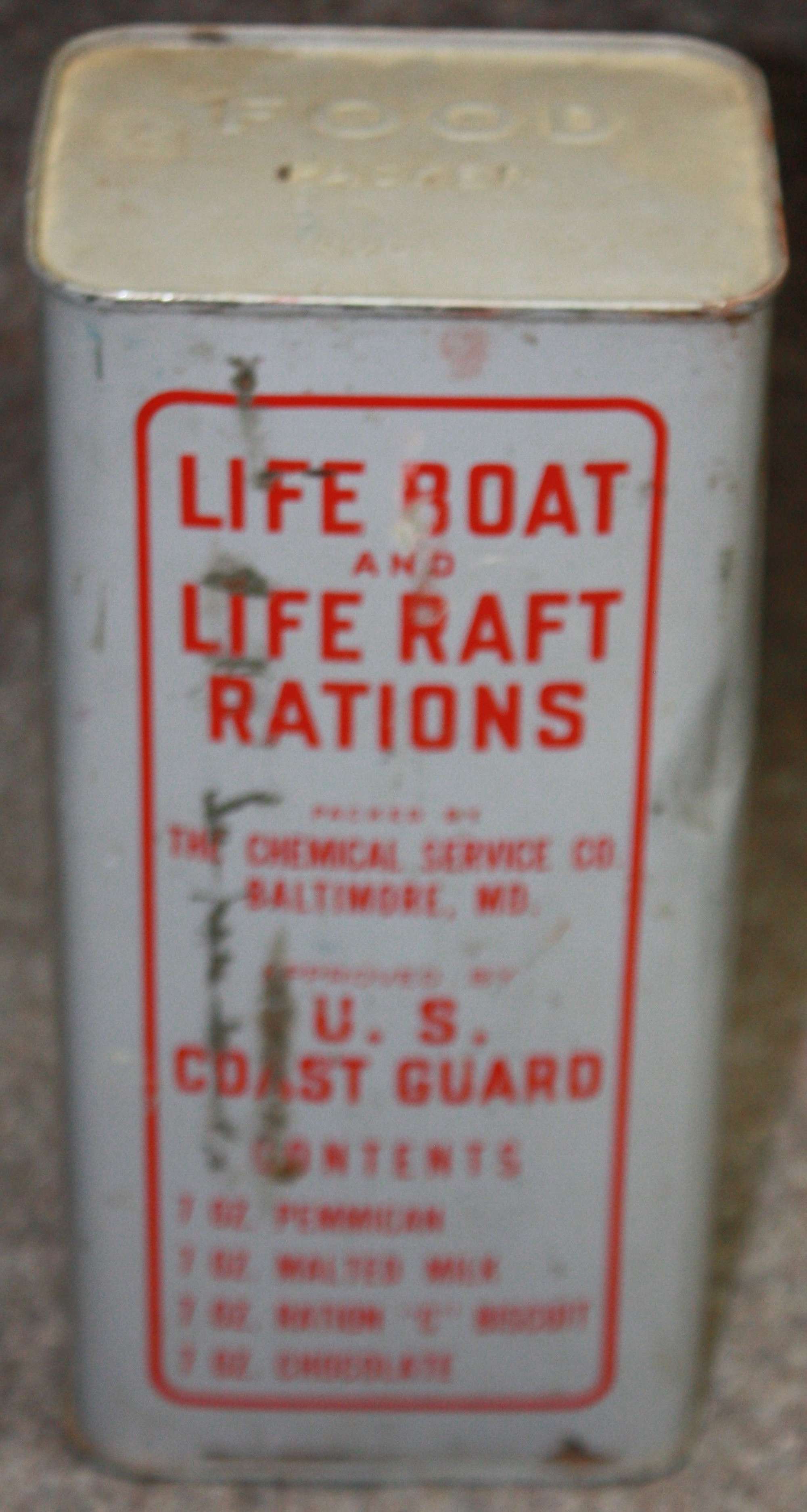 A UNOPENED 1945 DATED US COST GUARD LARGE SIZE LIFE RAFT RATION TIN