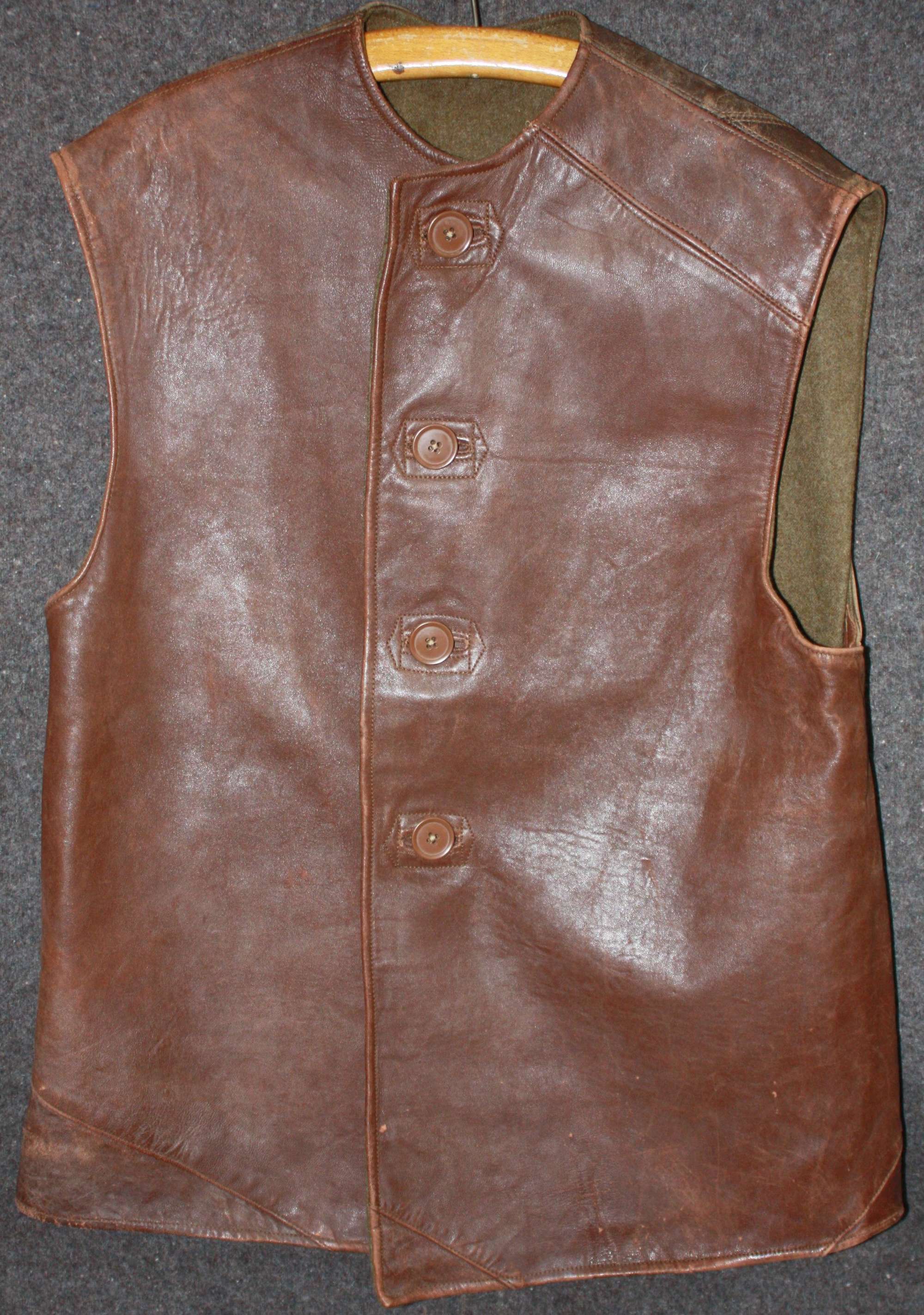 A VERY GOOD WWII 1942 DATED LEATHER JERKIN