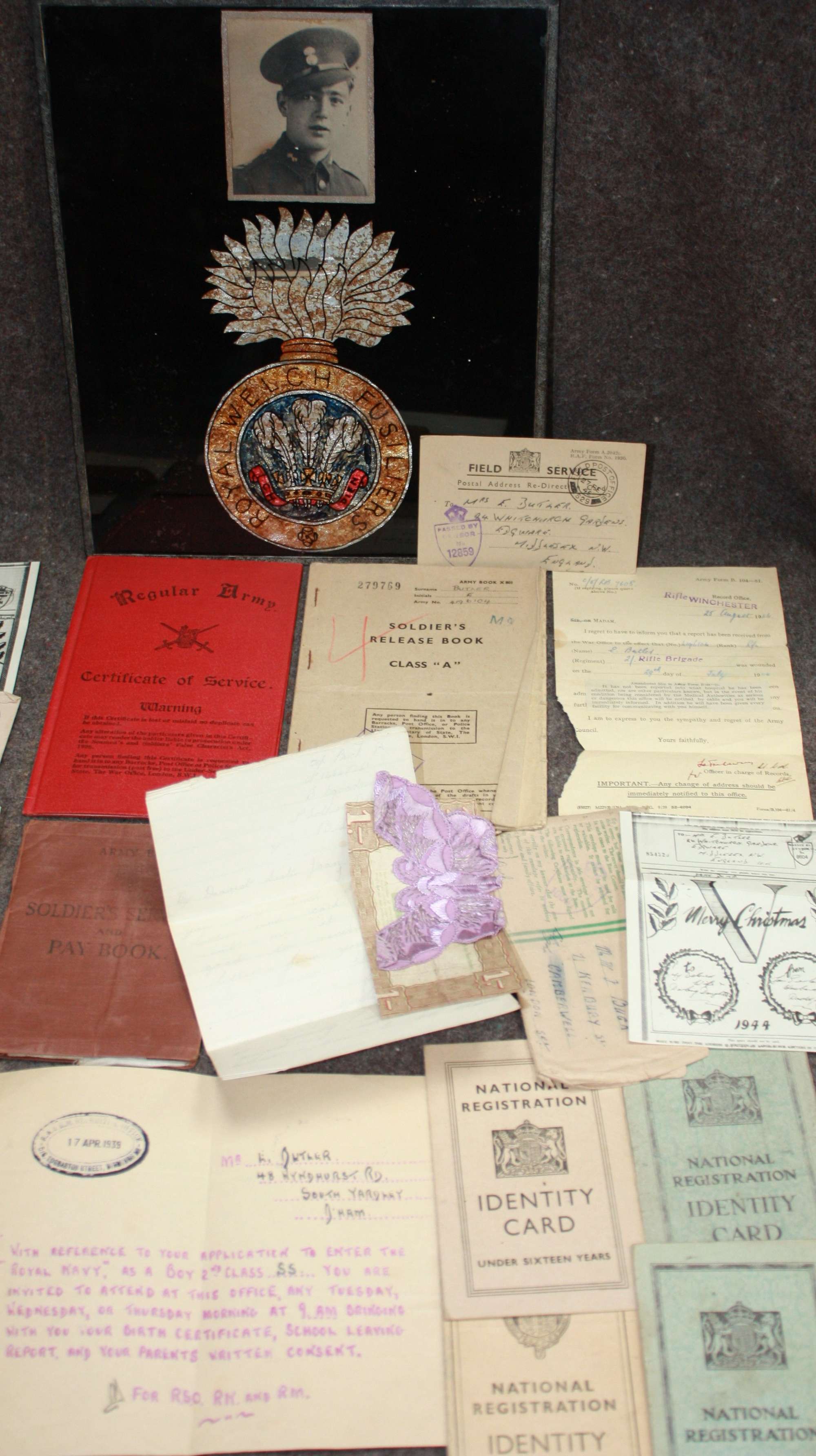 A WWII ROYAL WELSH FUSILIERS PAY BOOK AND OTHER DOCUMENTS