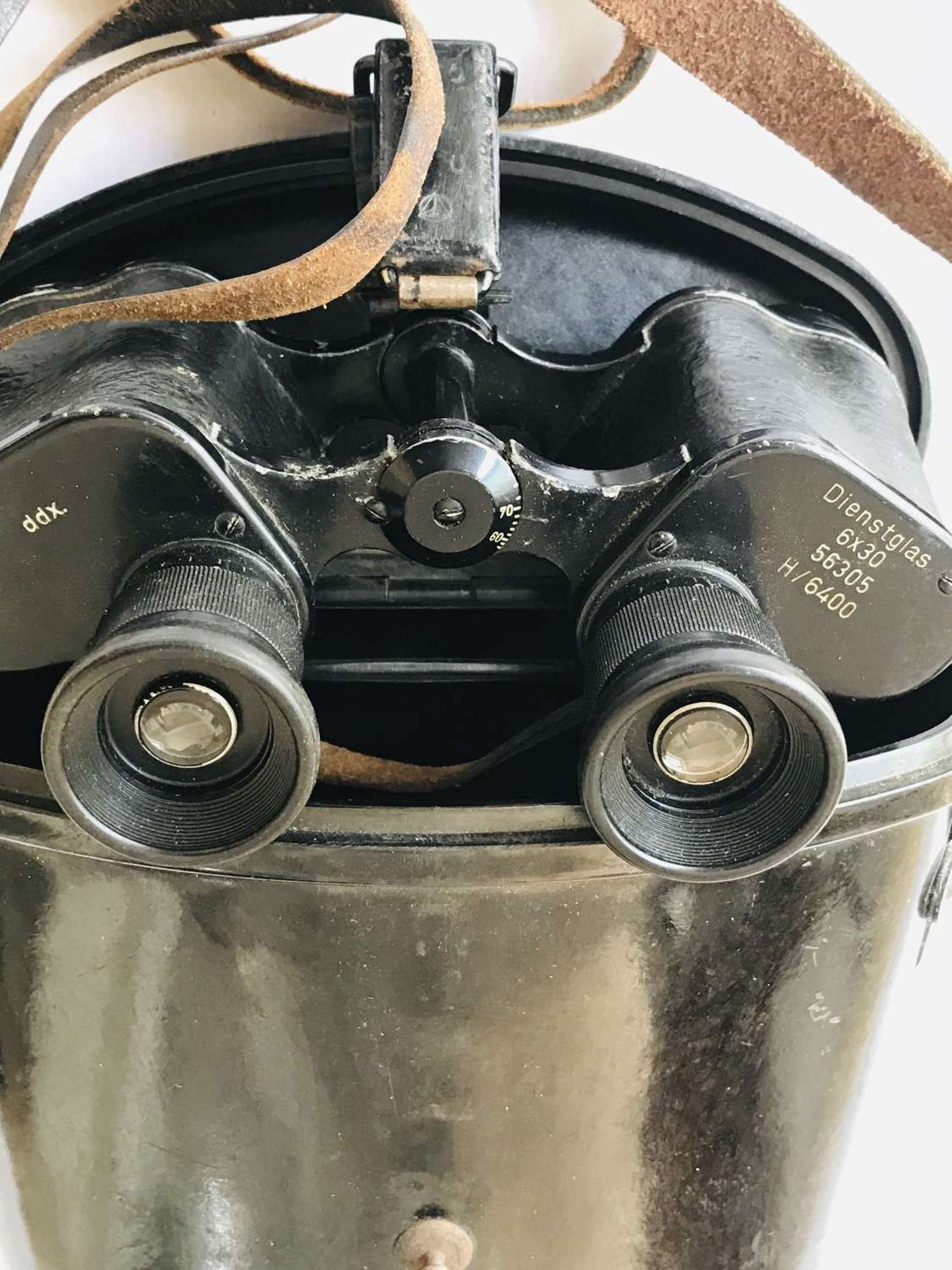 German binoculars 6x30 maker ddx with case.