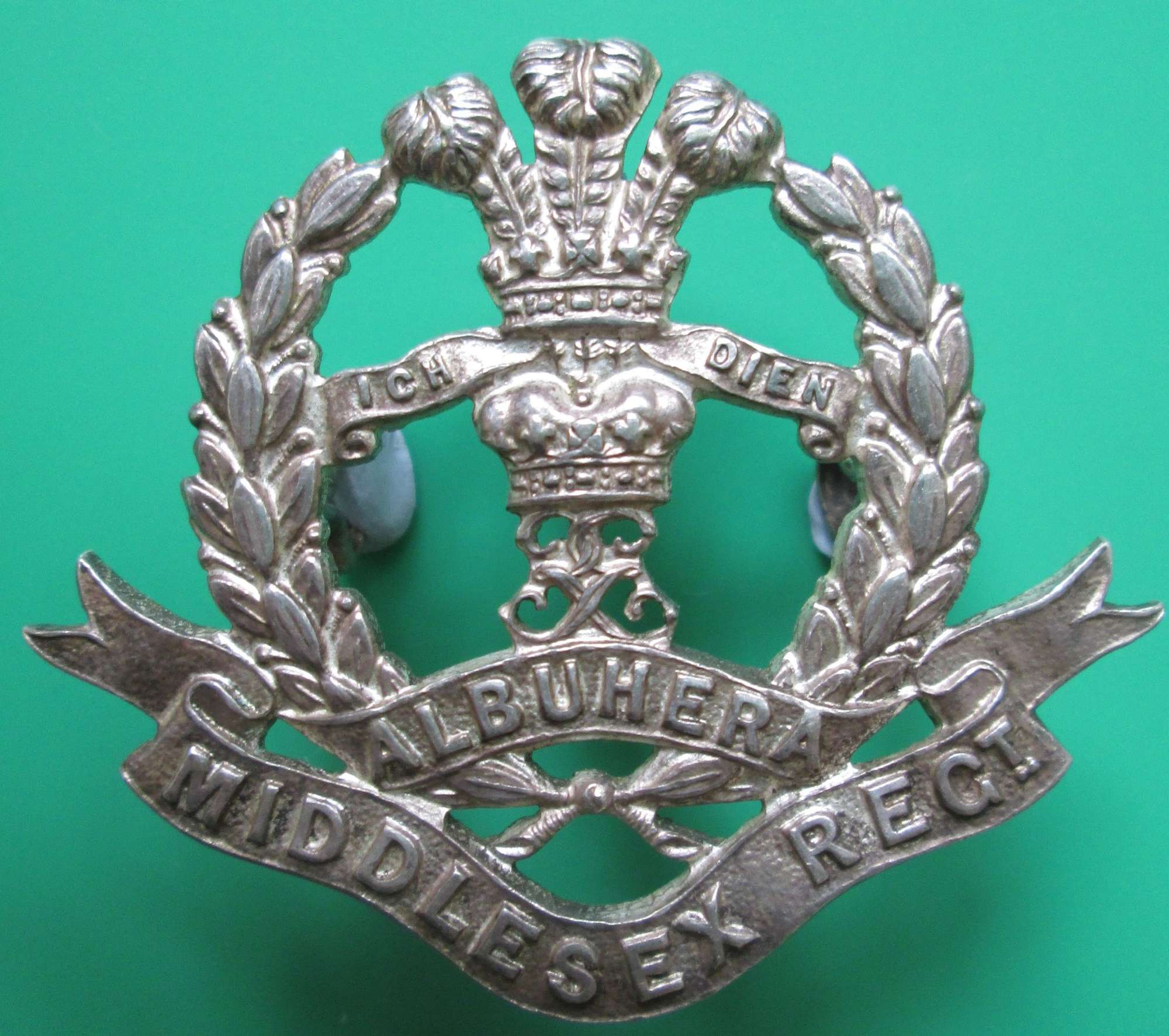 A SILVER PLATED OFFICERS MIDDLESEX REGIMENT BADGE