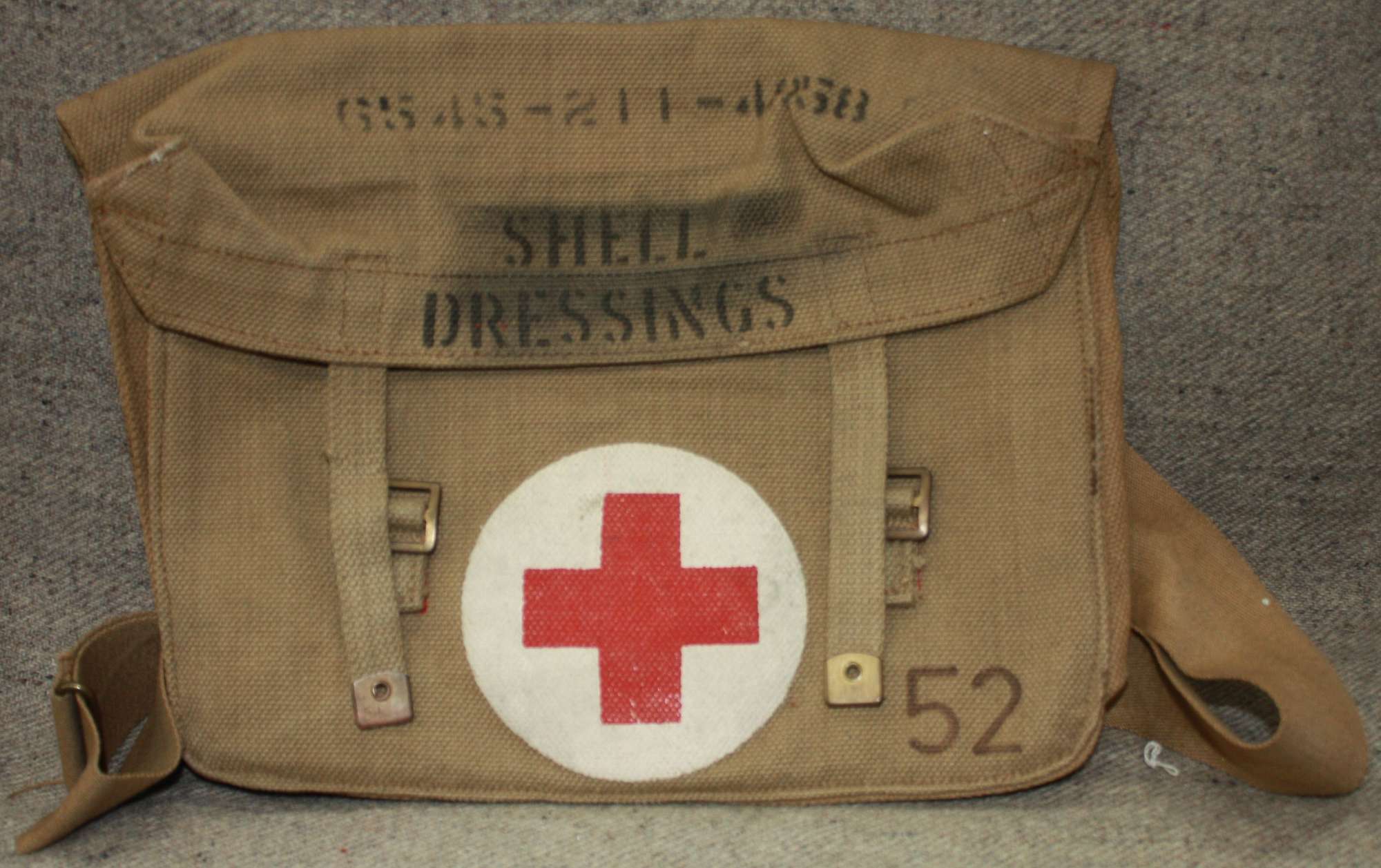 A WWII FIELD DRESSING BAG 1942 DATED